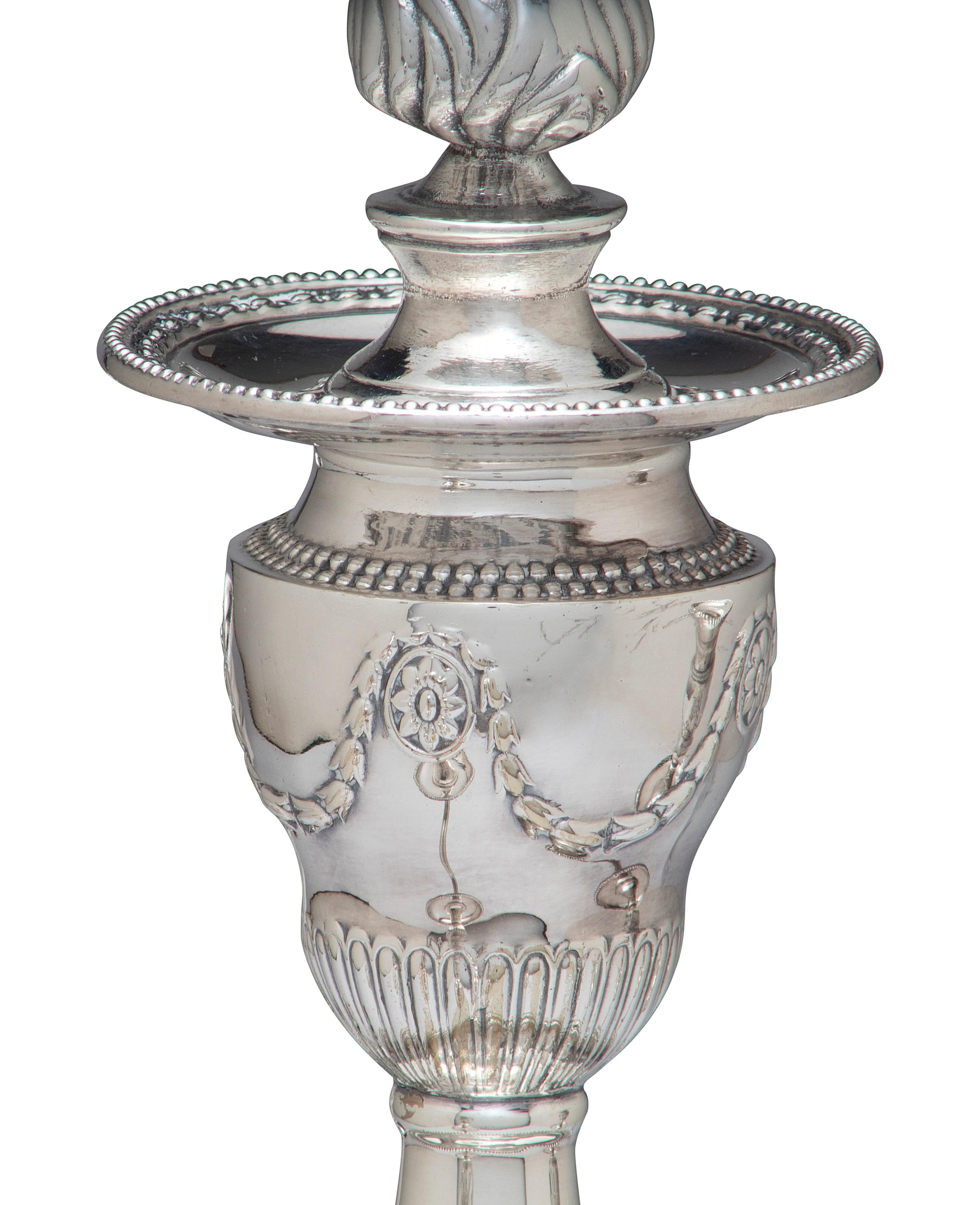 A Pair of Neoclassical Silver-Plate Four-Light Convertible Candelabra