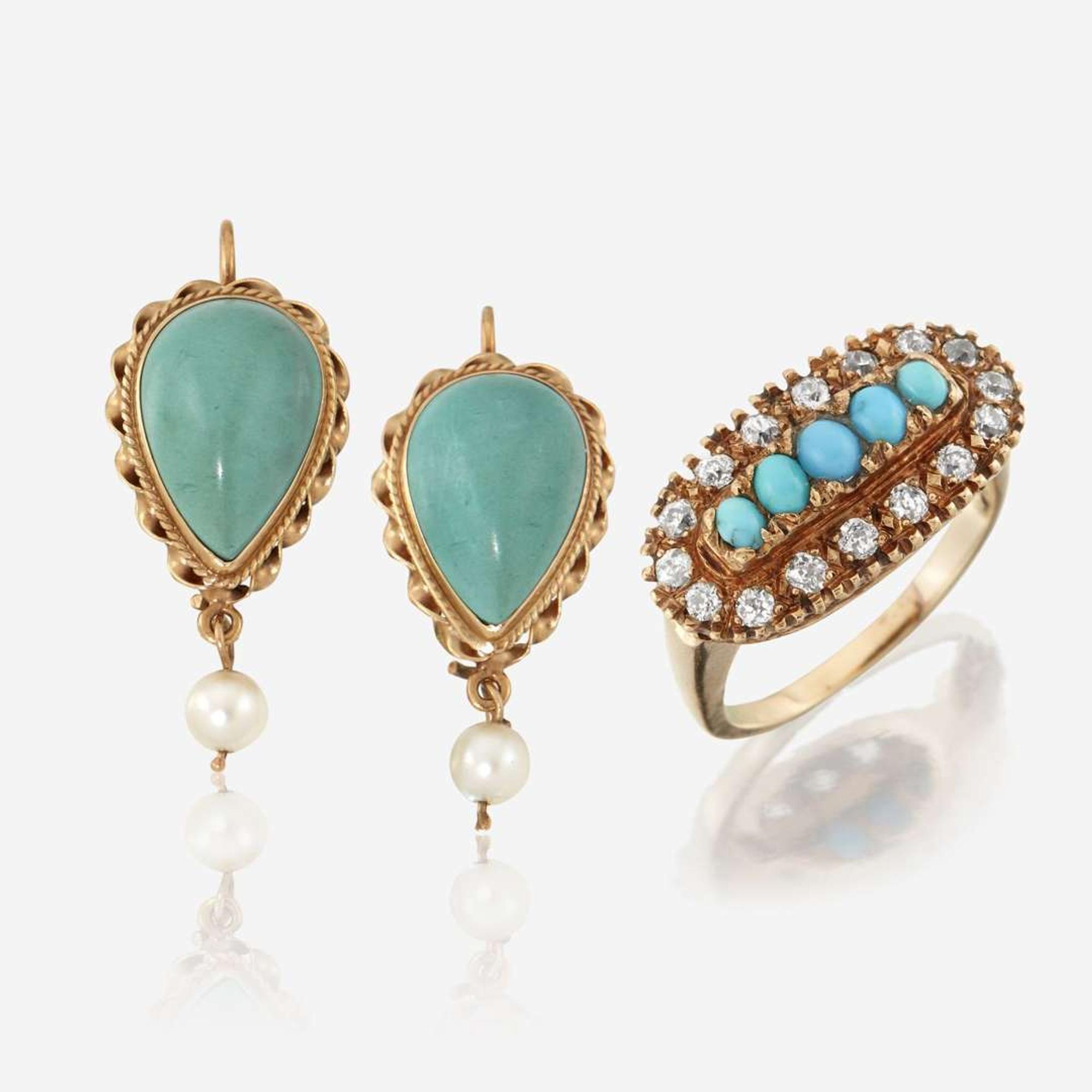 A turquoise and fourteen karat gold ring and earrings