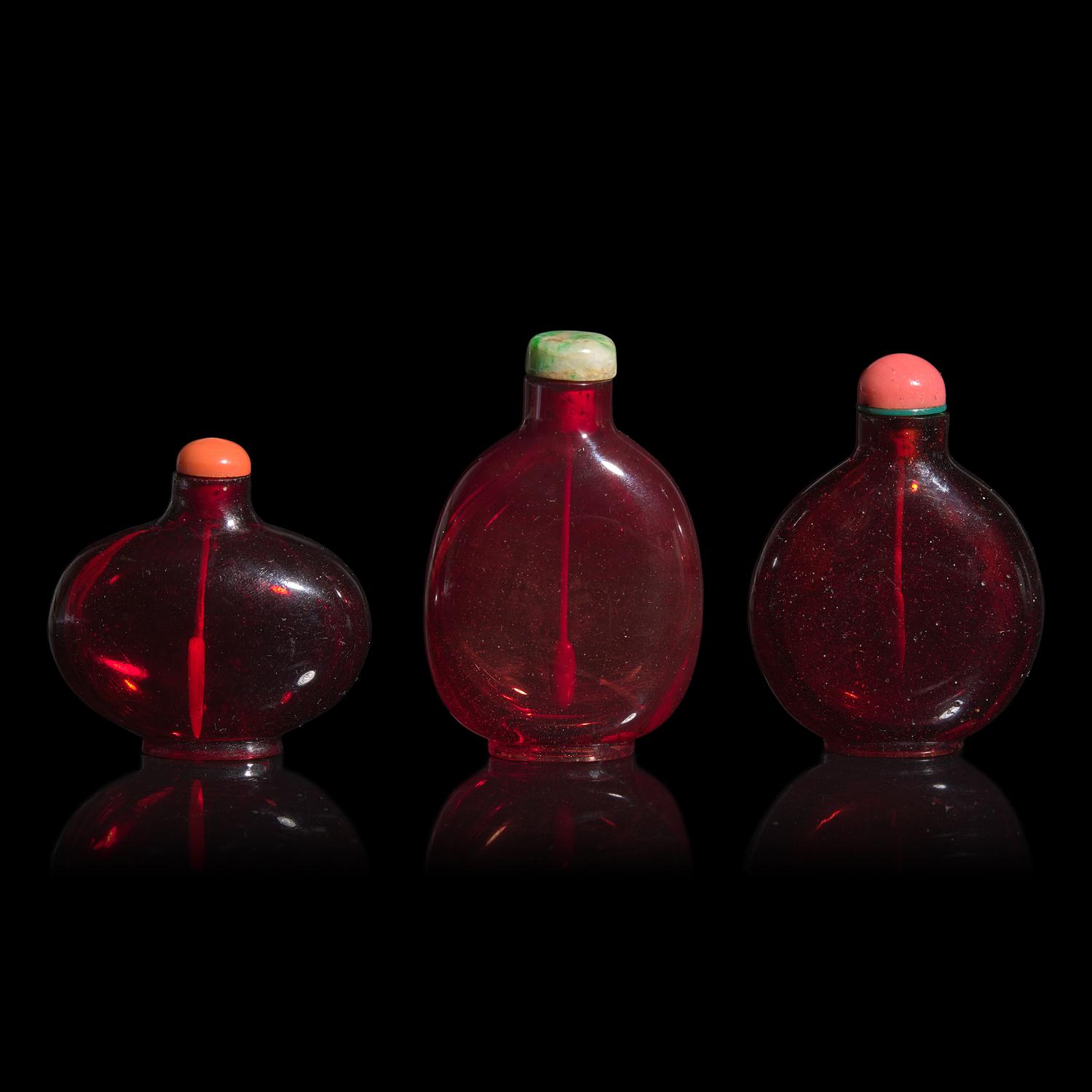 Three Chinese Ruby Glass Snuff Bottles