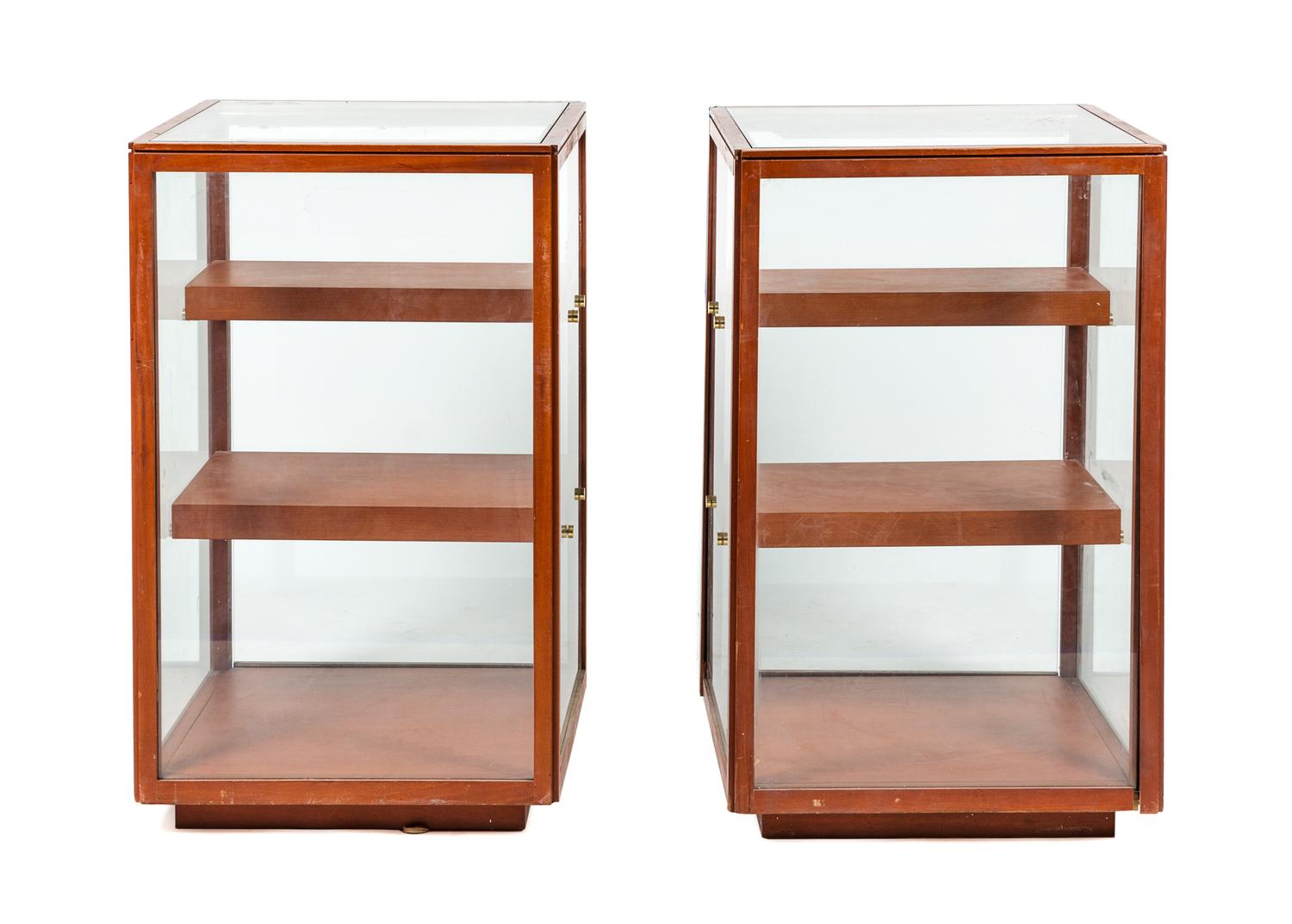 A Pair of Glass Display Cases Height 38 1/2 x width 23 3/4 x depth 23 3/4 inches. — MID 20TH CENTURY
