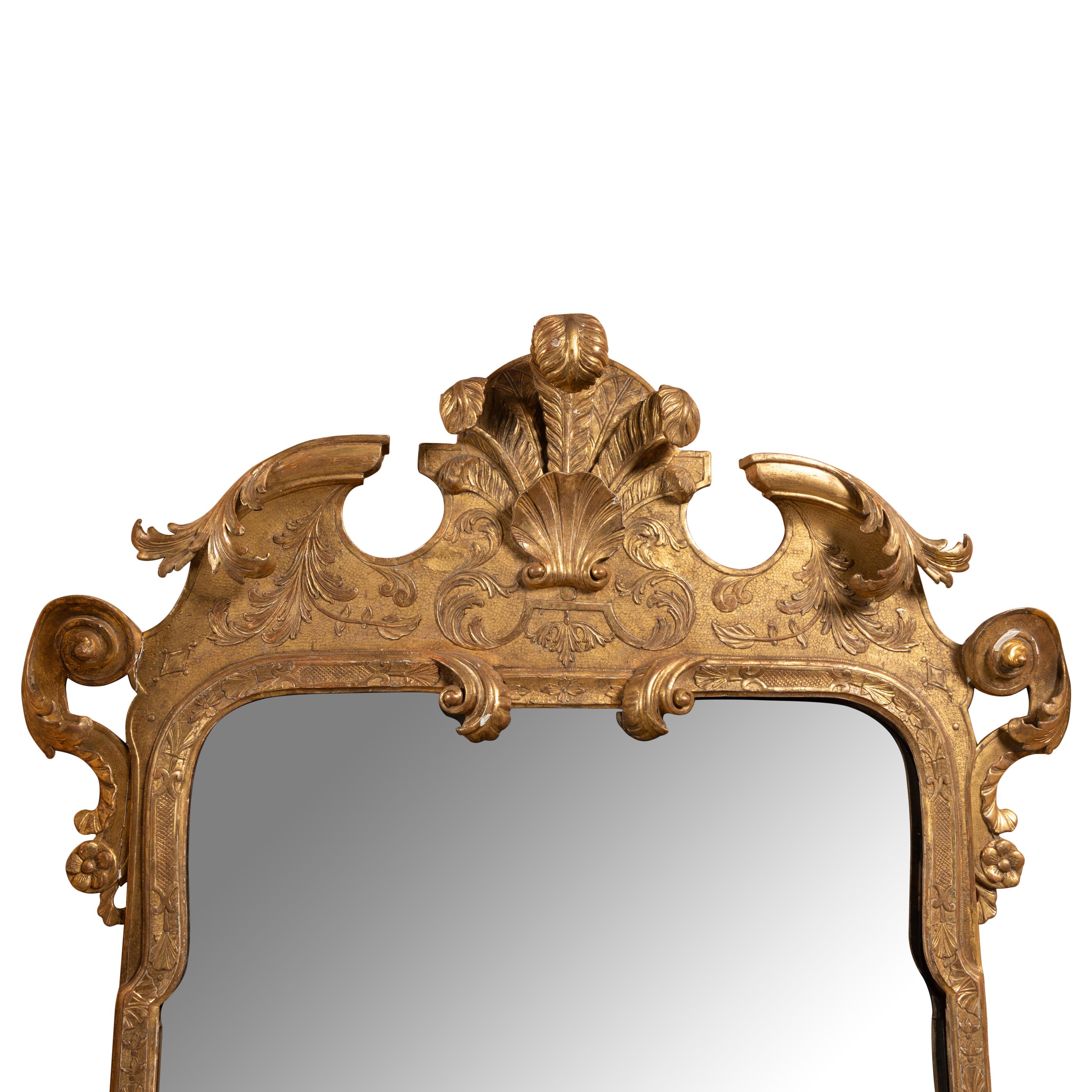 A Pair of George I Giltwood Mirrors
