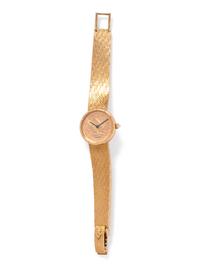 CORUM, 18K YELLOW GOLD US $5 COIN WRISTWATCH