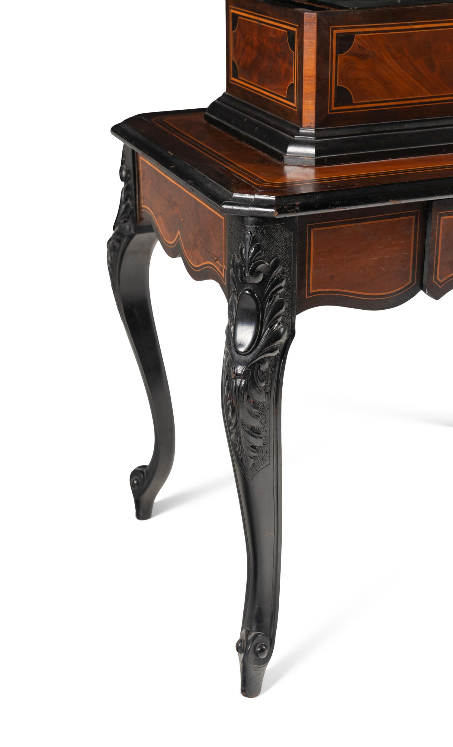 An Ideal Piccolo Music Box on Table by Mermod Frères