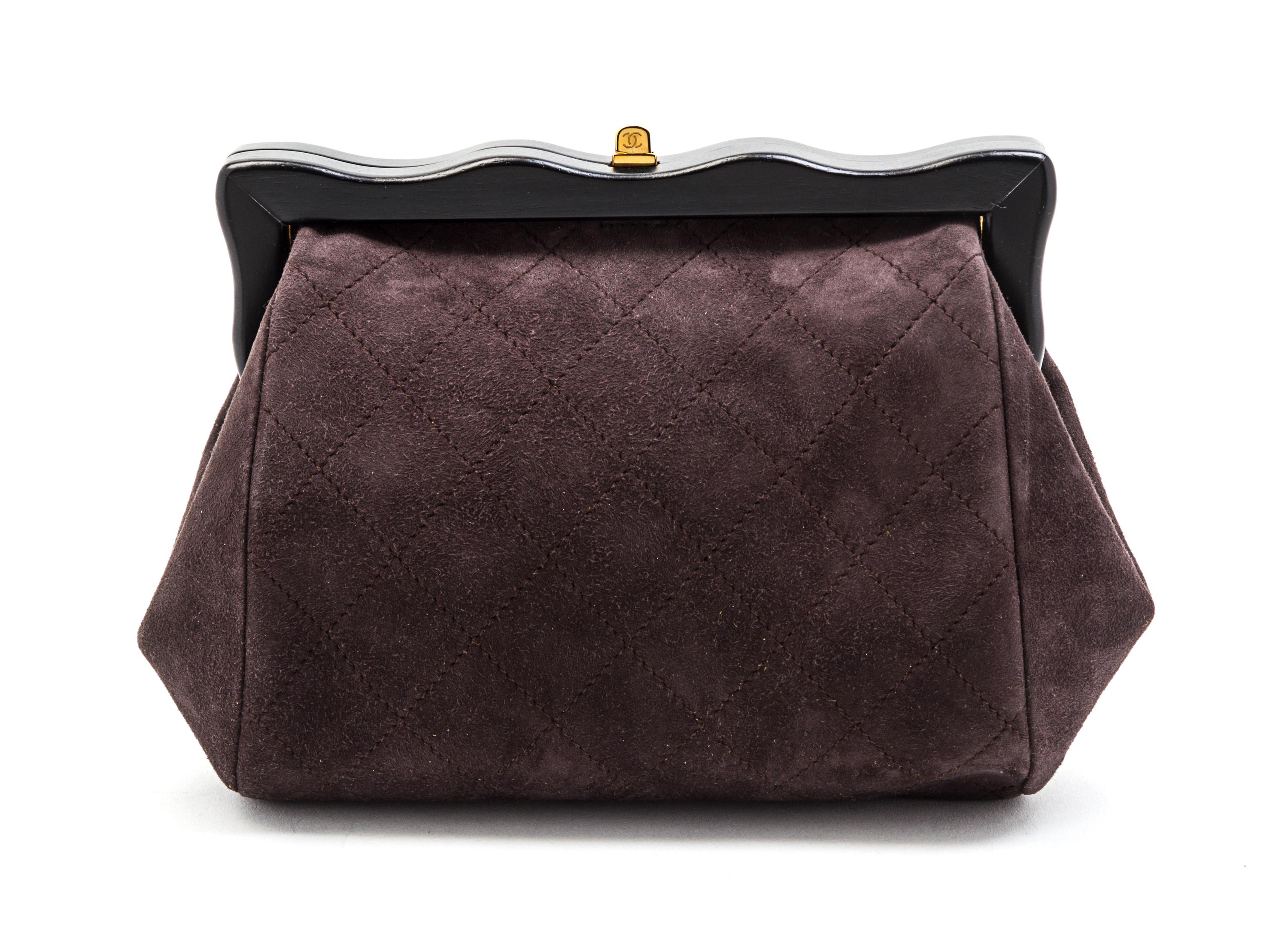 A Chanel Gray Quilted Suede Oversized Clutch, 10 x 7 x 4 inches.