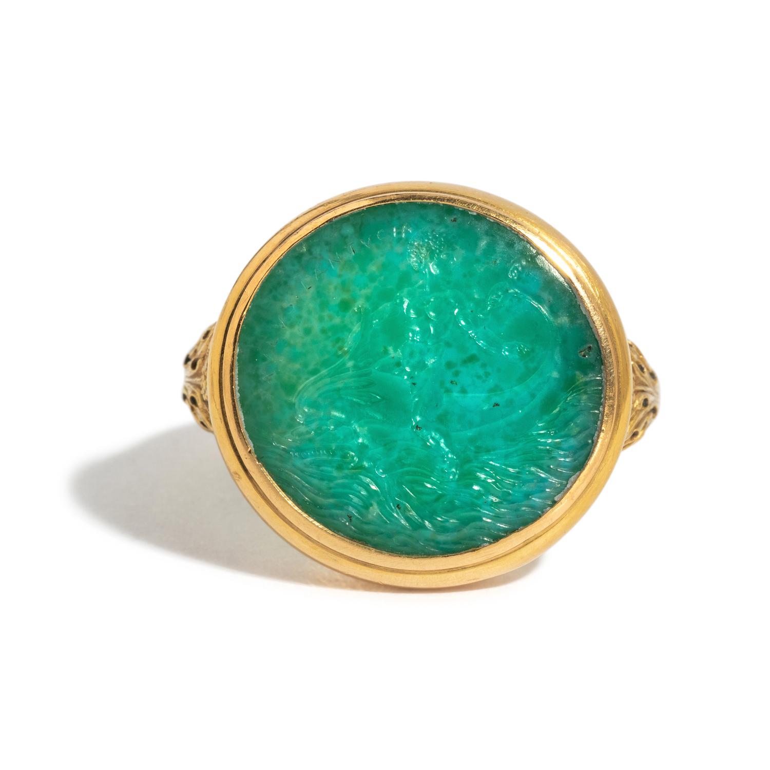 A Neoclassical Amazonite and Gold Finger Ring with the God Eros Riding a Dolphin and a Greek Inscription