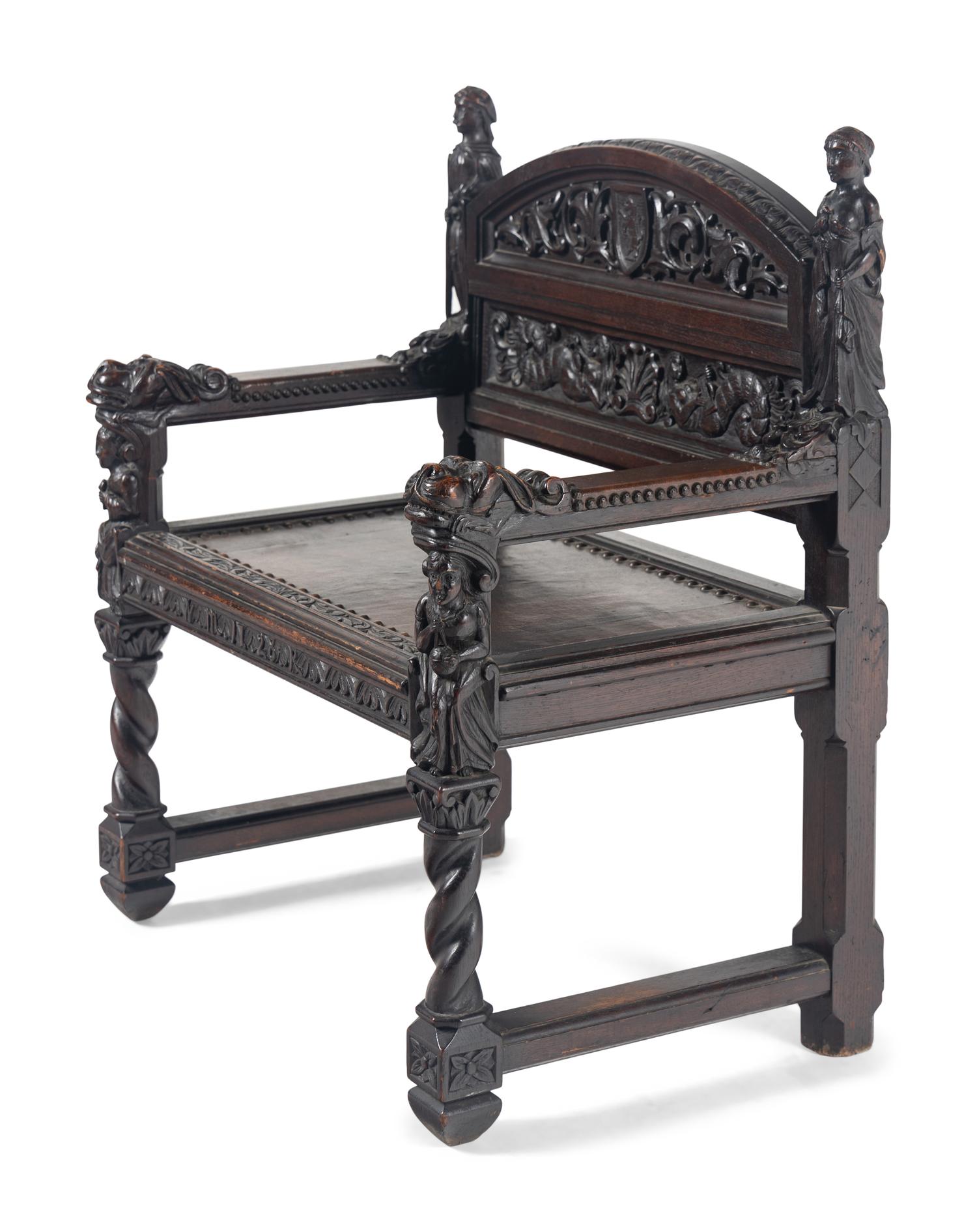 A William and Mary Style Carved Walnut Armchair