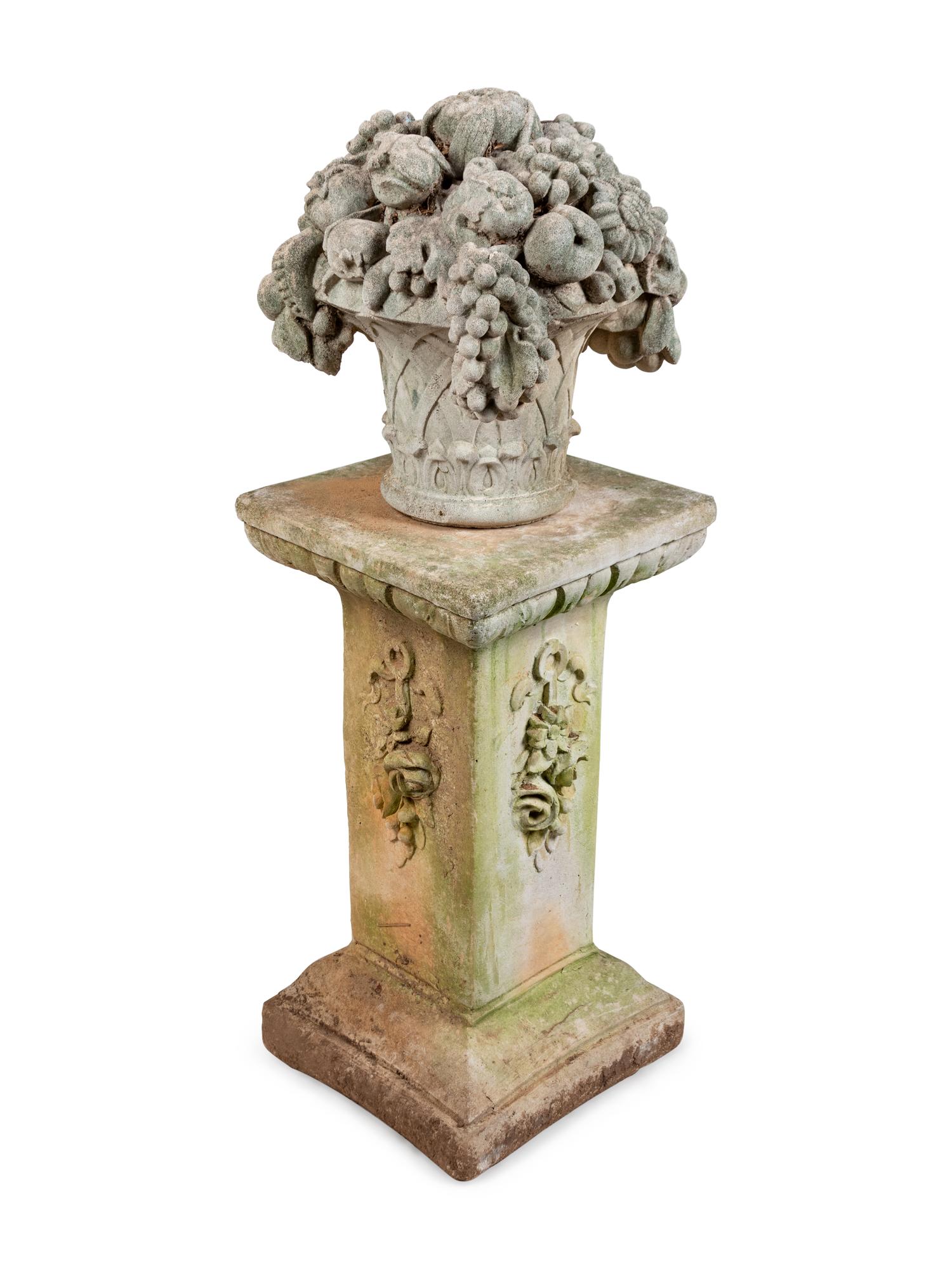 A Cast Stone Garden Ornament and Pedestal