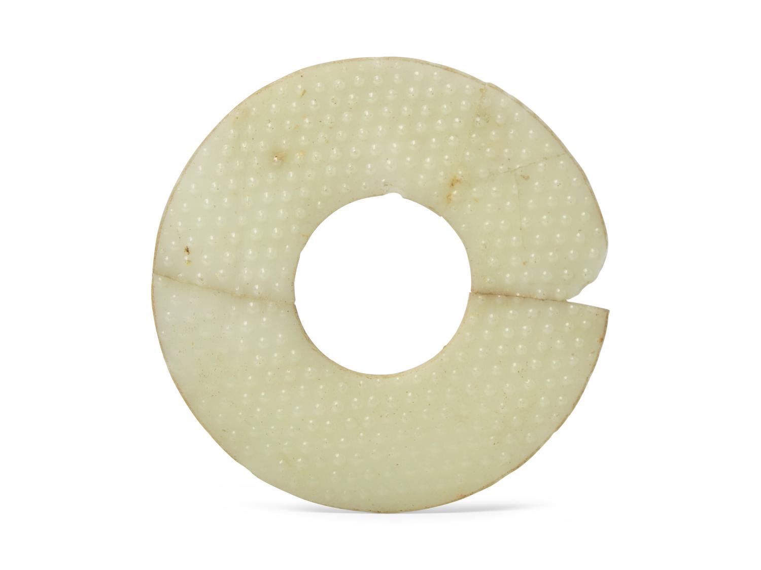 A Chinese Molded White Glass Bi-disc, Possibly Han Dynasty (202 BC. - 220 AD.) 或漢 琉璃璧