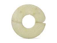 A Chinese Molded White Glass Bi-disc, Possibly Han Dynasty (202 BC. - 220 AD.) 或漢 琉璃璧