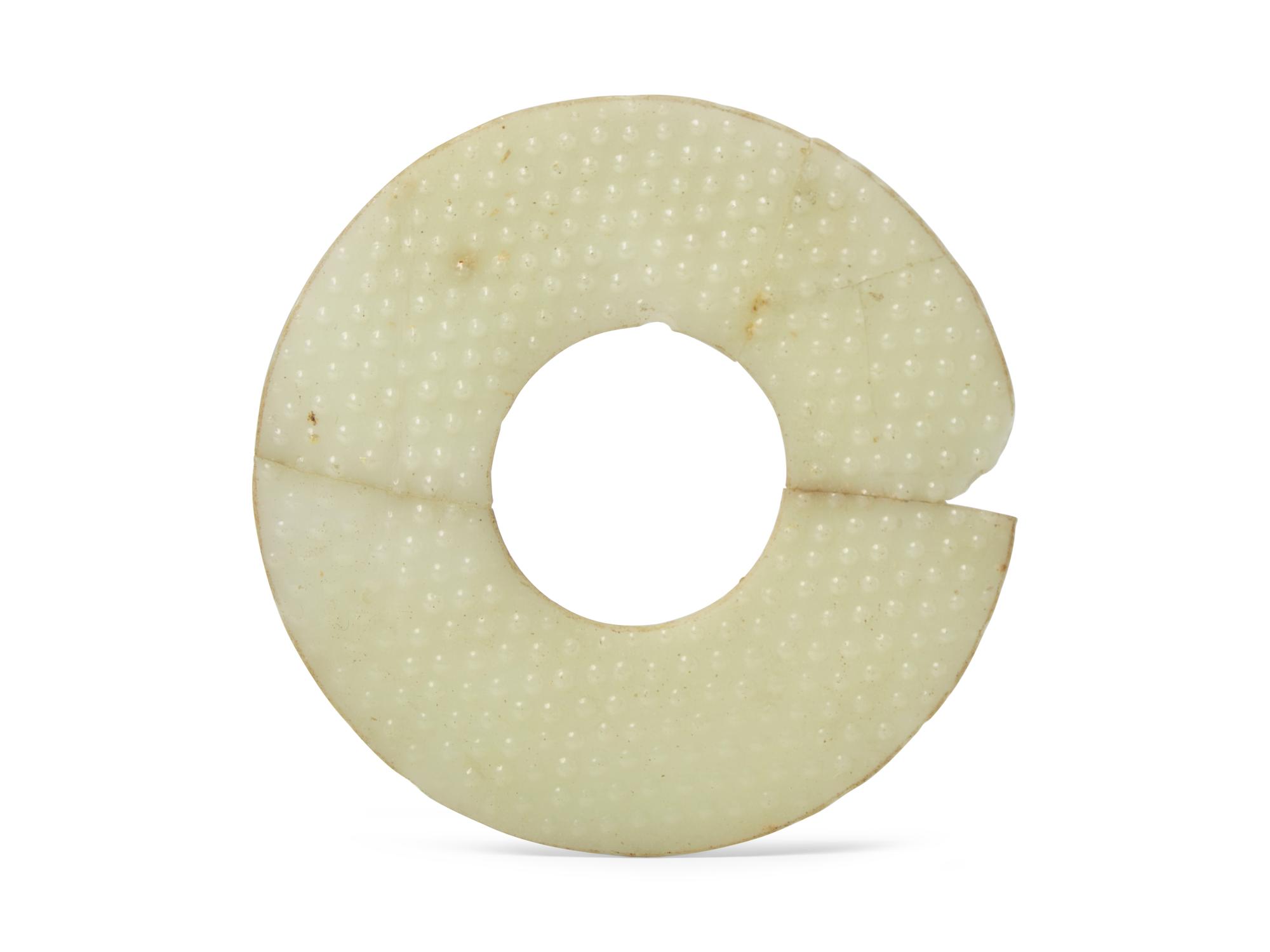A Chinese Molded White Glass Bi-disc, Possibly Han Dynasty (202 BC. - 220 AD.) 或漢 琉璃璧