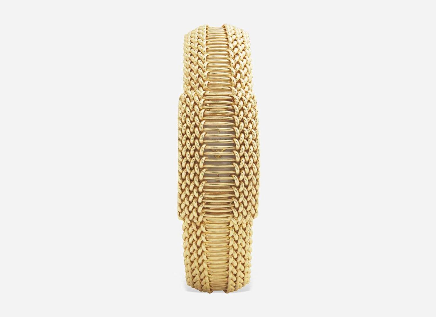 A Ladies 14K Yellow Gold Hidden Dial Watch