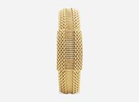 A Ladies 14K Yellow Gold Hidden Dial Watch