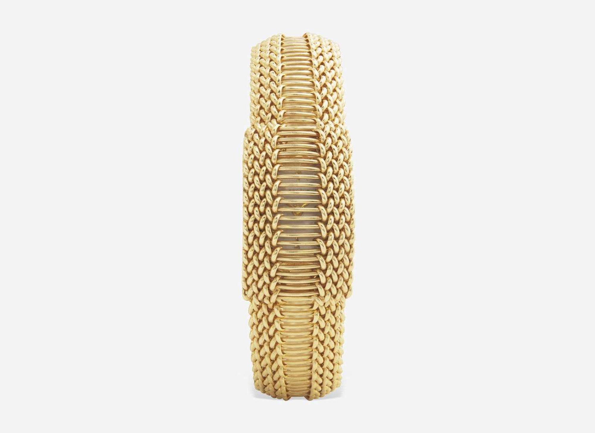 A Ladies 14K Yellow Gold Hidden Dial Watch