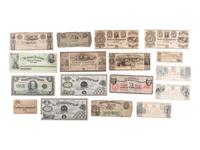 [STOCKS & BONDS] Lot of 33 both used and unused stocks, checks, and bonds as well as store certificates.