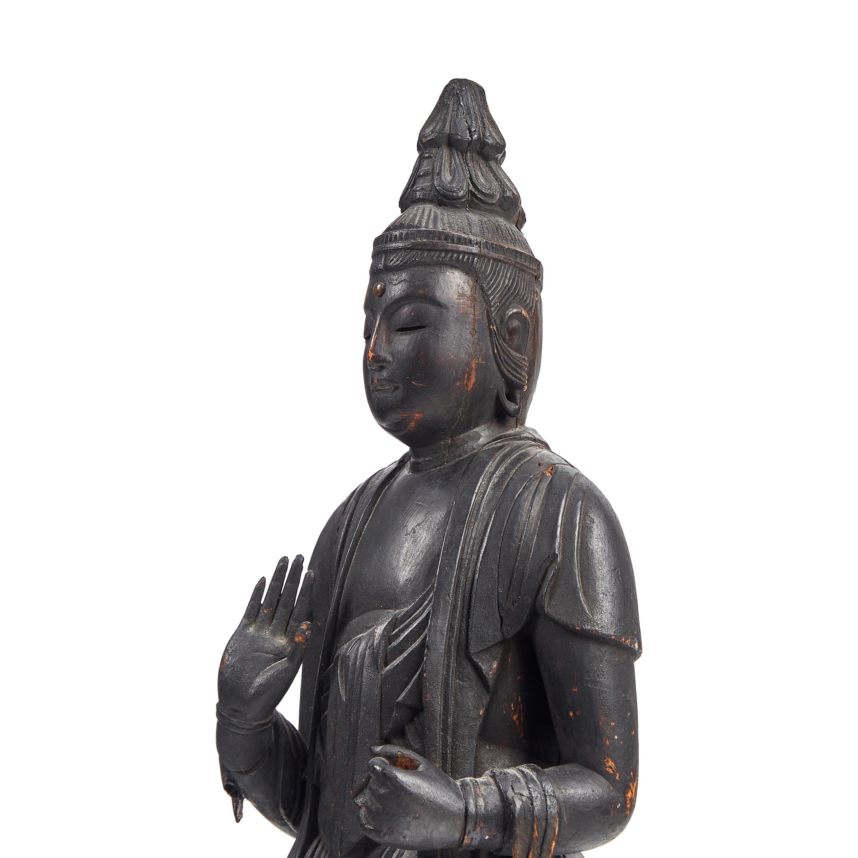 A Large Japanese Carved and Stained Wood Standing Figure of Kannon Bosatsu , Heian Period, 11th/12th Century