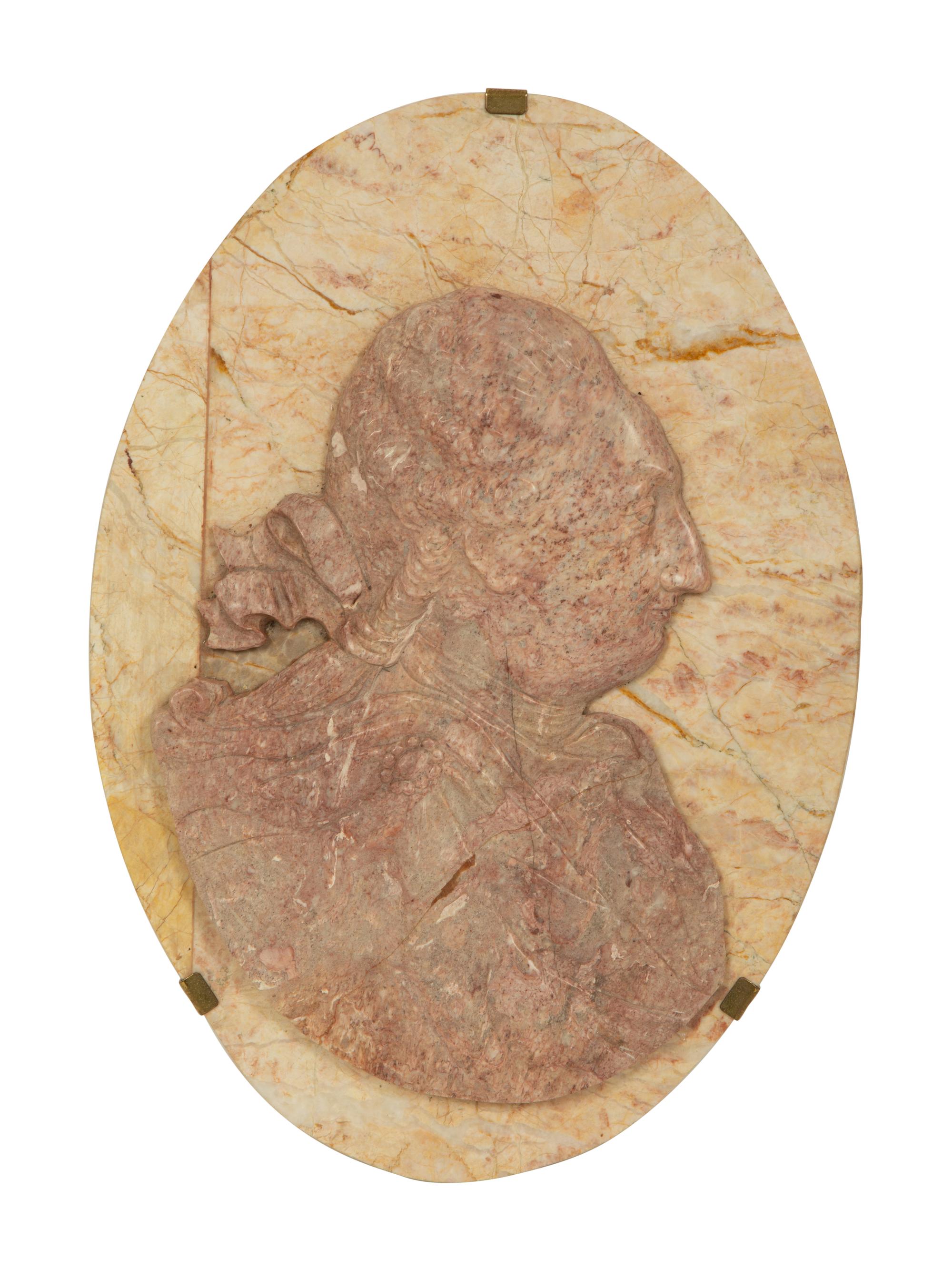 A Pair of Bi-Color Marble Profile Portrait Plaques