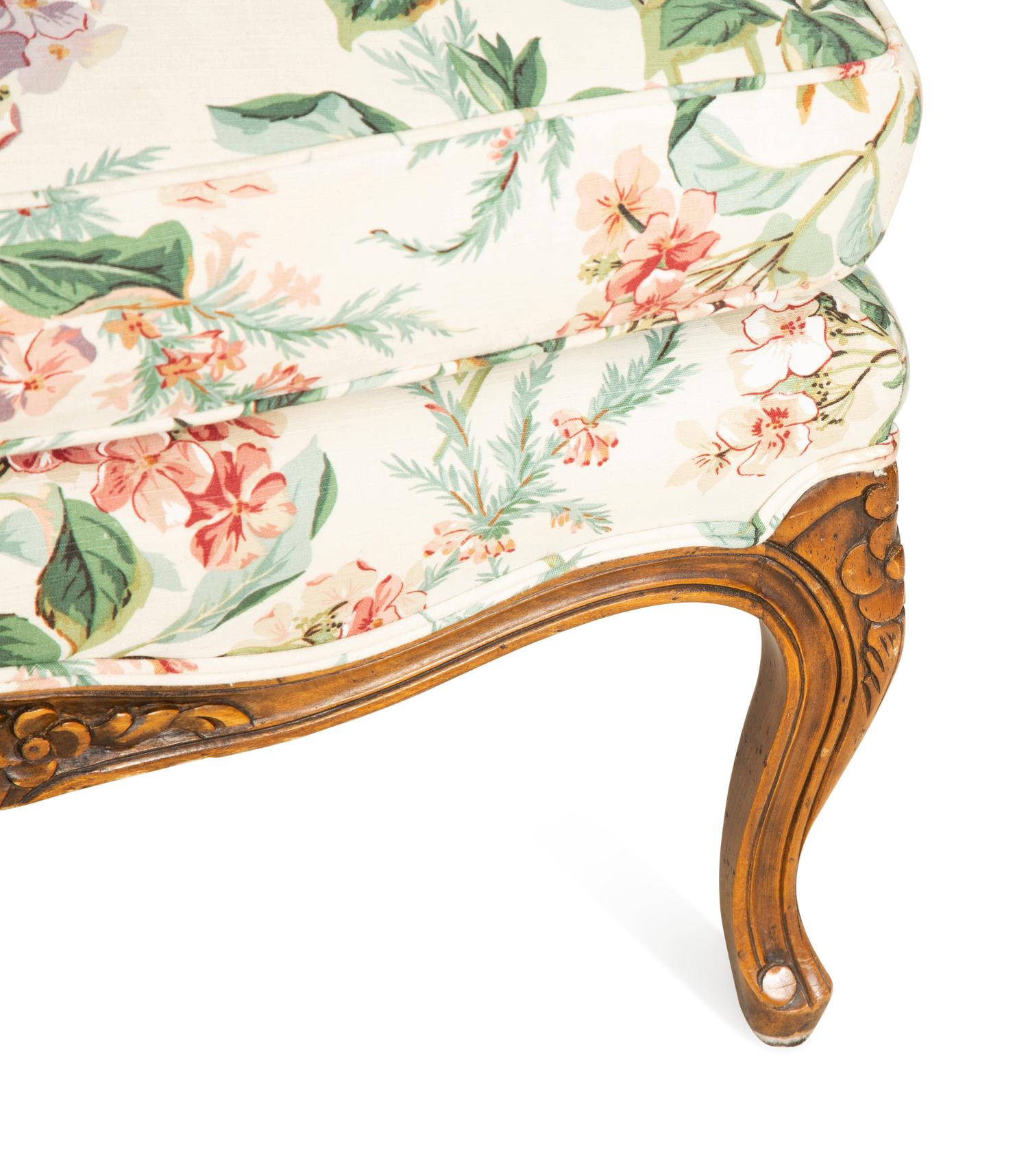 A Pair of Louis XV Style Walnut Bergères
