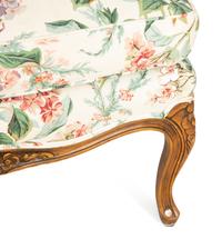 A Pair of Louis XV Style Walnut Bergères