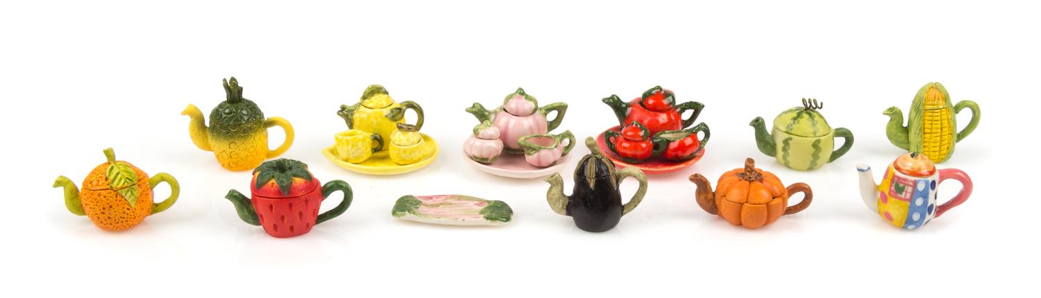A Collection of Ceramic Tea Articles Diameter of largest platter 1 1/8 inches. — Various Makers