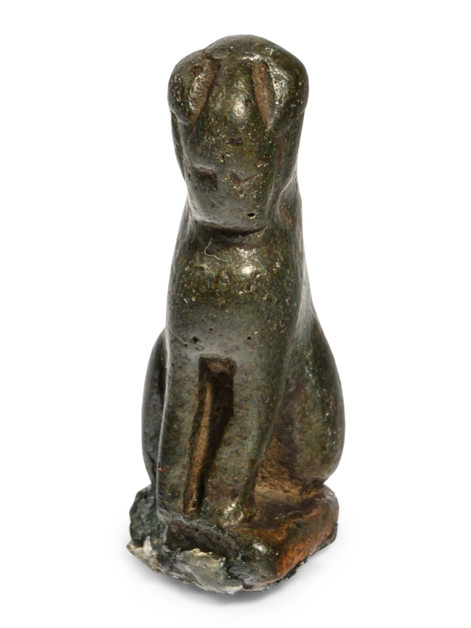 An Egyptian Bronze Sphinx