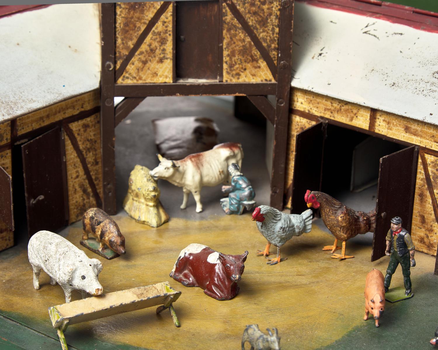 A Painted Tin and Wood Toy Barn Diorama