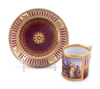A Vienna Painted and Parcel Gilt Porcelain Teacup and Saucer