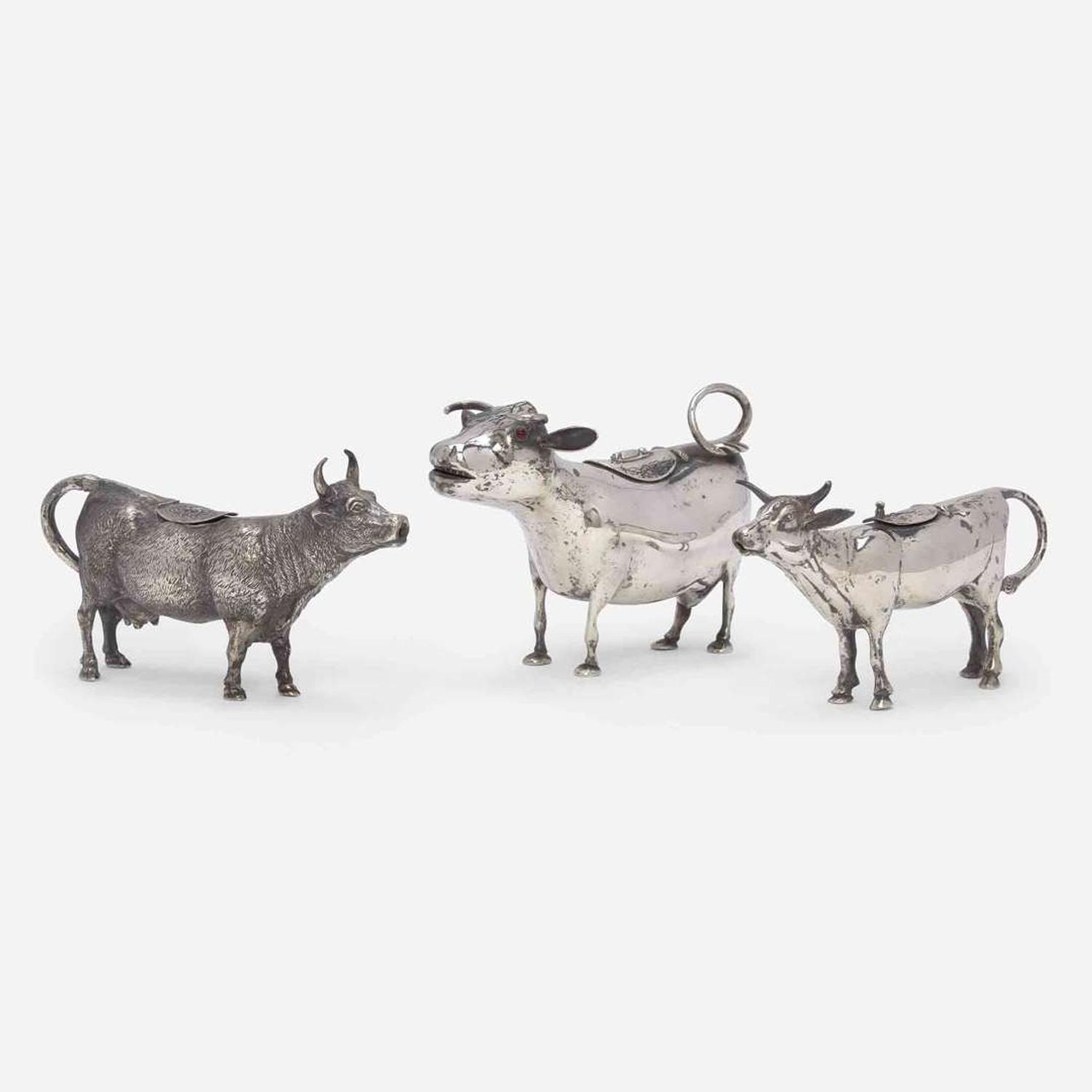 A group of three Continental silver cow creamers 19th / early 20th century