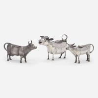 A group of three Continental silver cow creamers 19th / early 20th century