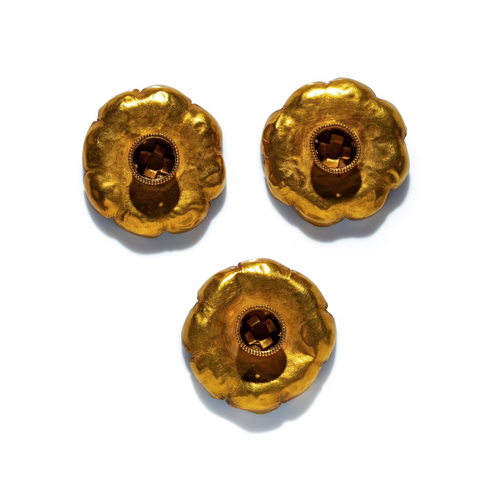 Three Hellenistic Gold and Enamel Rosettes