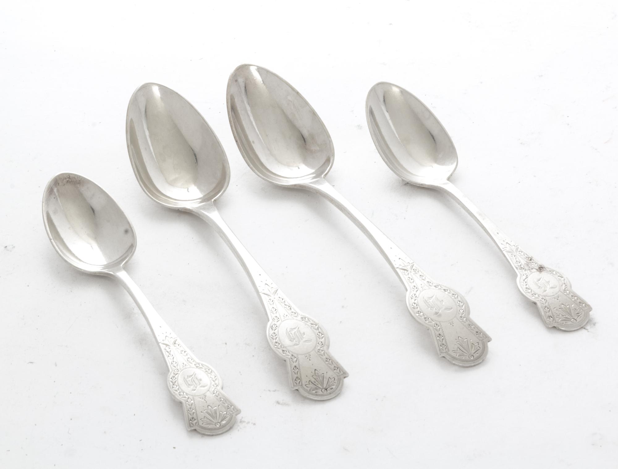 A Collection of American Coin Silver Spoons, N. Harding & Co., Boston, MA, comprising 11 teaspoons and 11 soup spoons, each decorated w