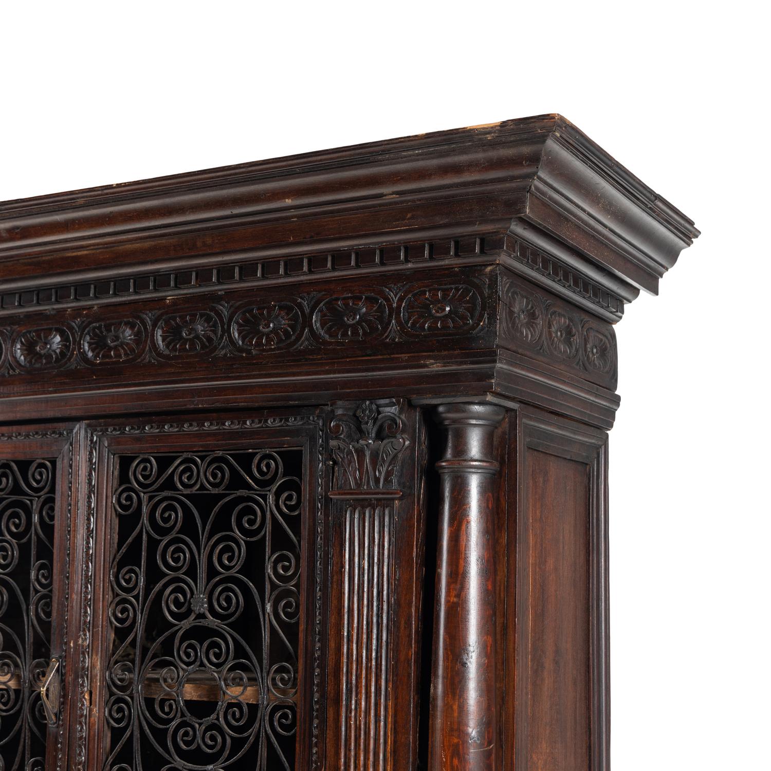 An Italian Renaissance Style Carved Walnut Cabinet