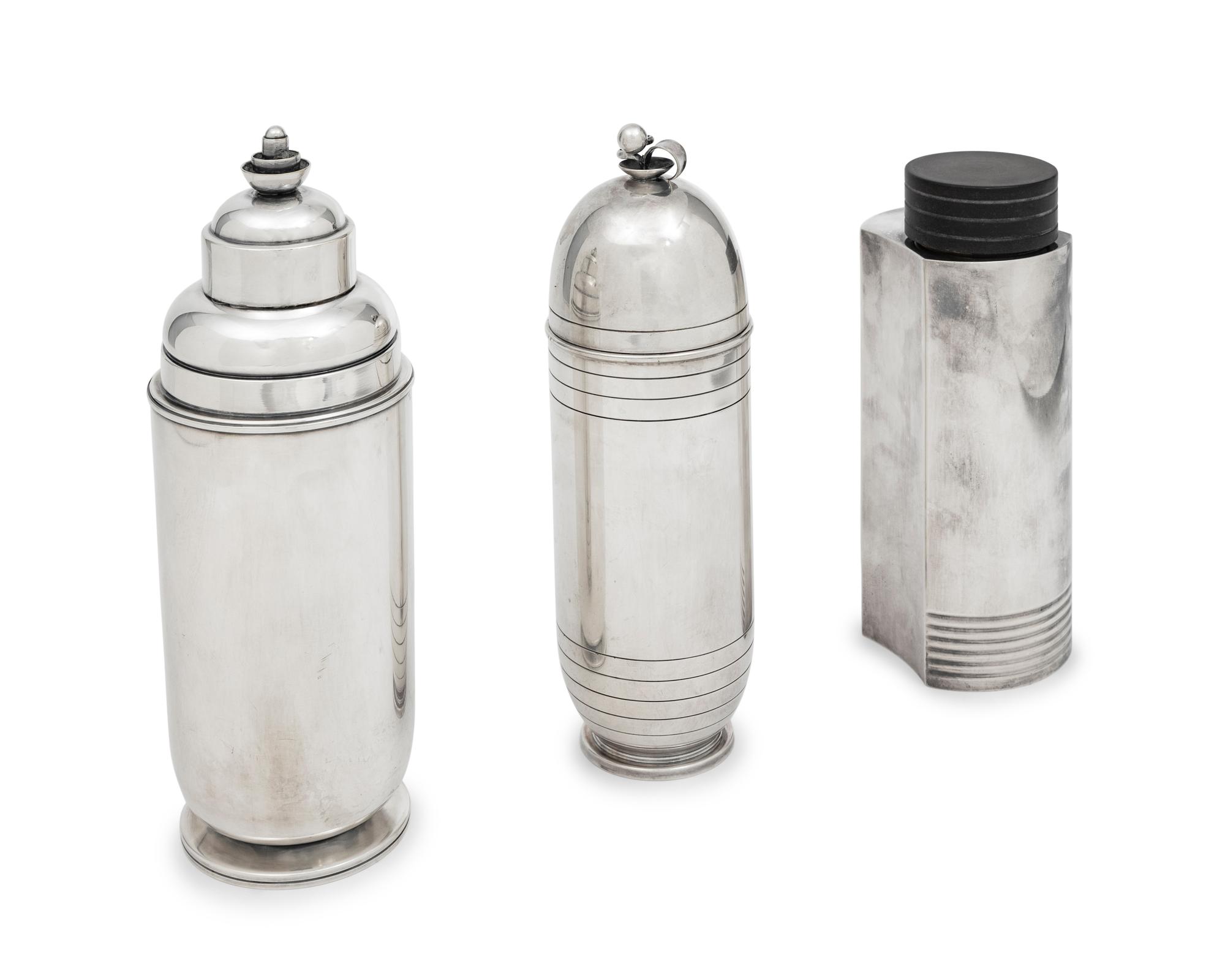 A Group of Three Cocktail Shakers