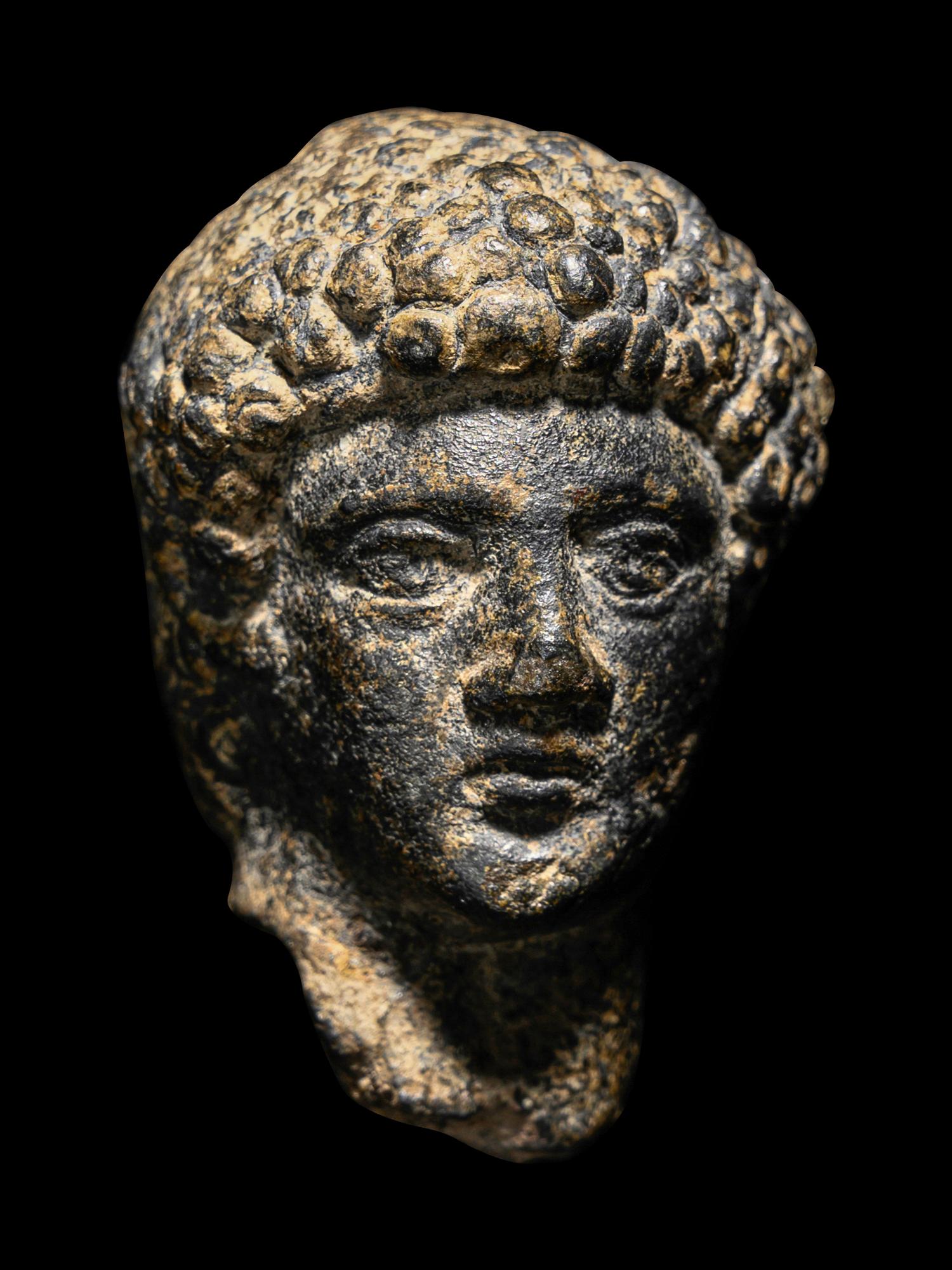 A Roman Bronze Head of Apollo