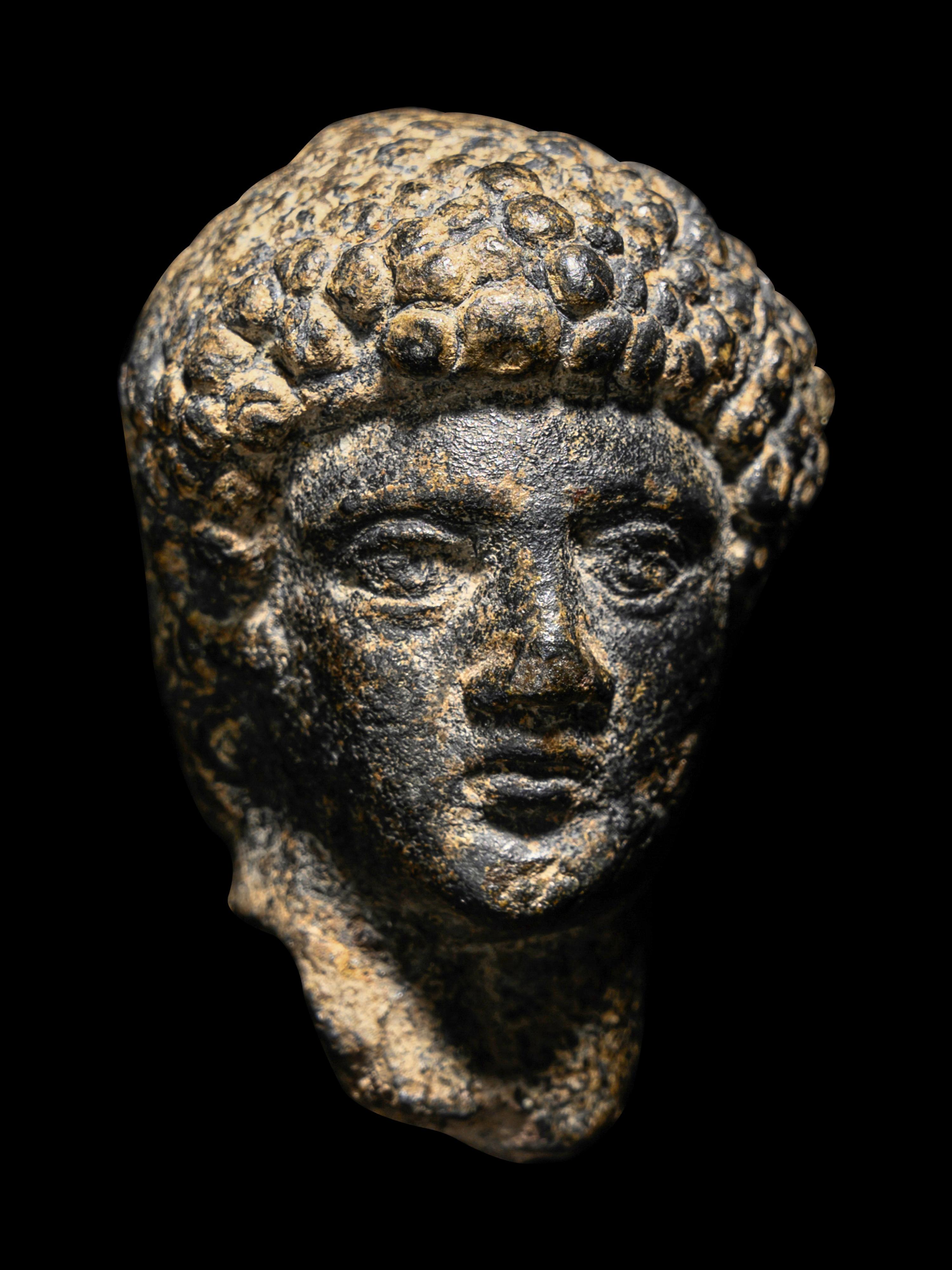 A Roman Bronze Head of Apollo