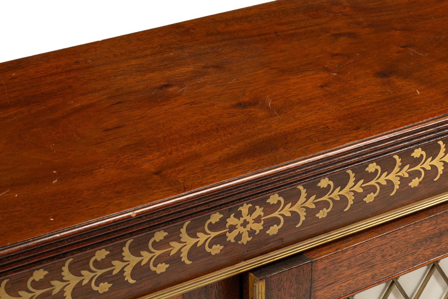 A Pair of Regency Style Brass Inlaid Mahogany Cabinets