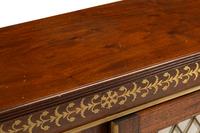 A Pair of Regency Style Brass Inlaid Mahogany Cabinets