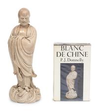 A Chinese Blanc de Chine Porcelain Figure of a Lohan