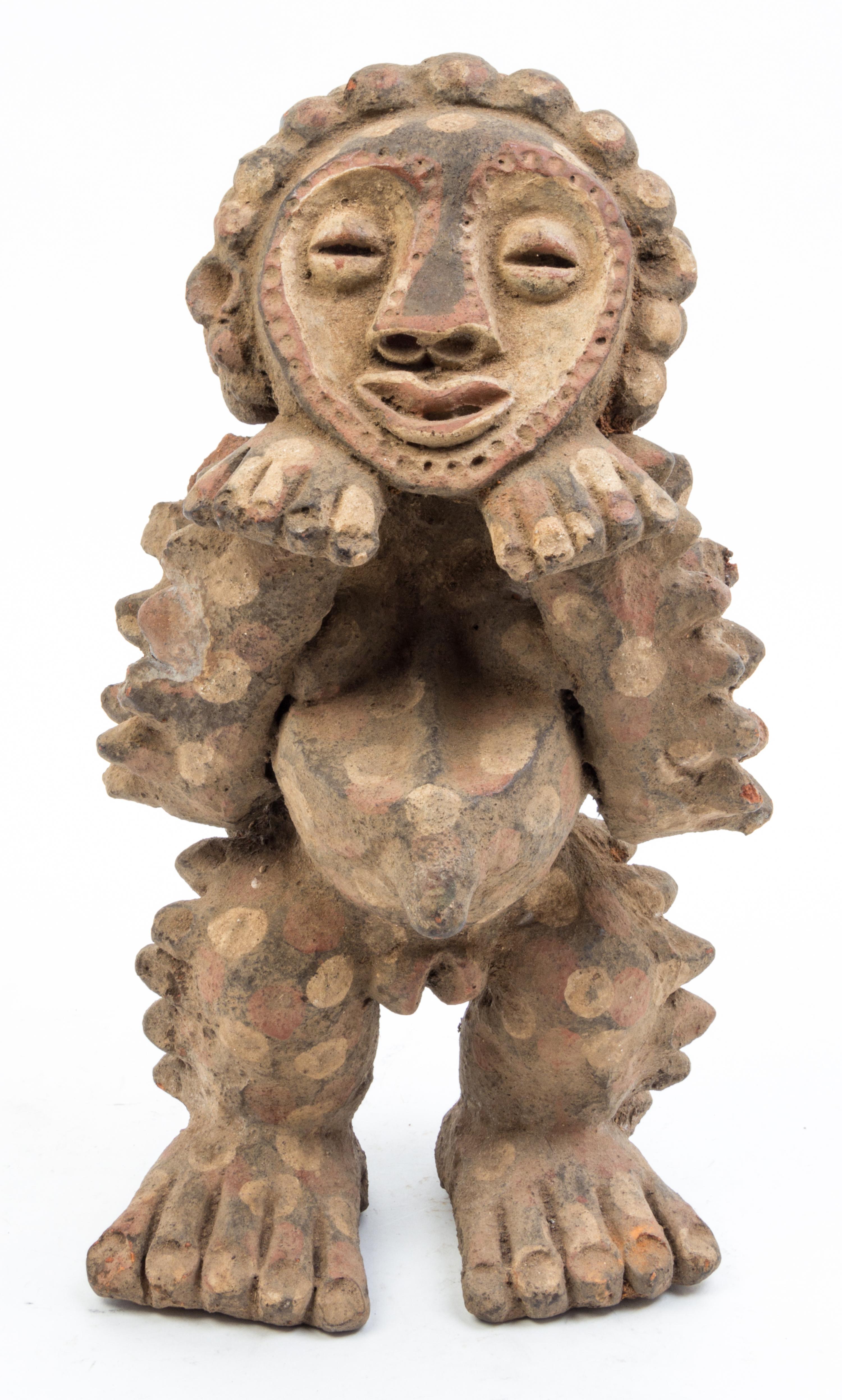 Two Ceramic Figures Height of taller 16 inches.