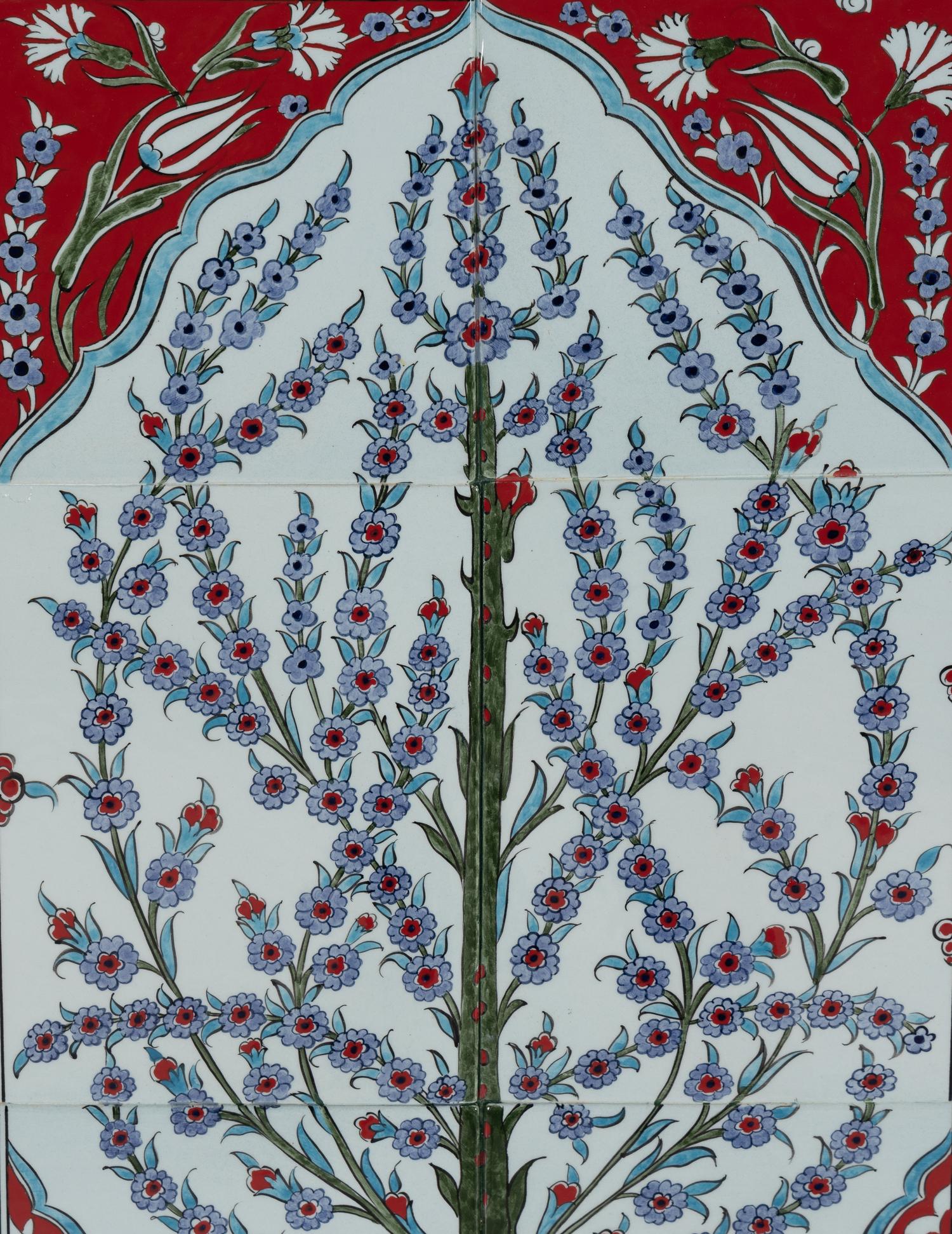 A Framed Set of Six Middle Eastern Glazed Earthenware Tiles