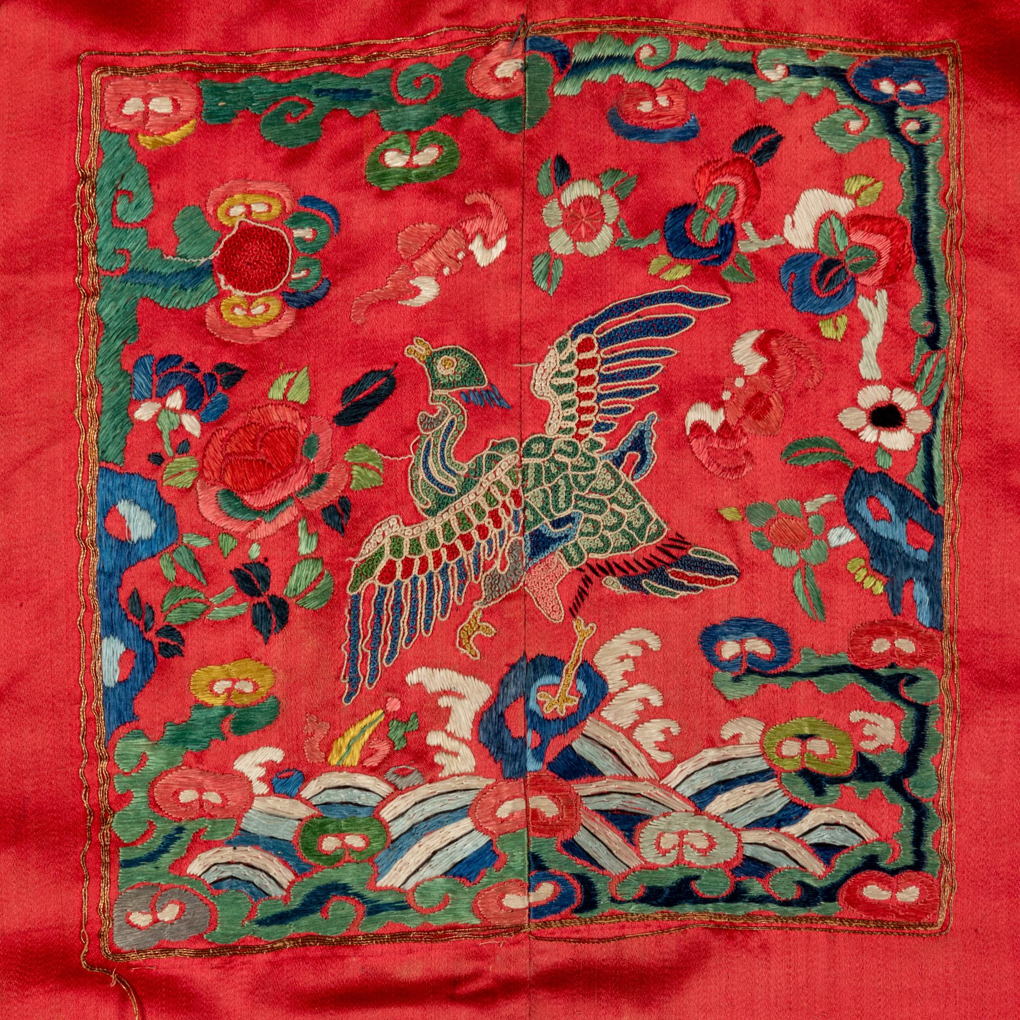 Two Chinese Red Ground Embroidered Silk Robes, 19th Century 清晚期 紅緞地袍褂兩件