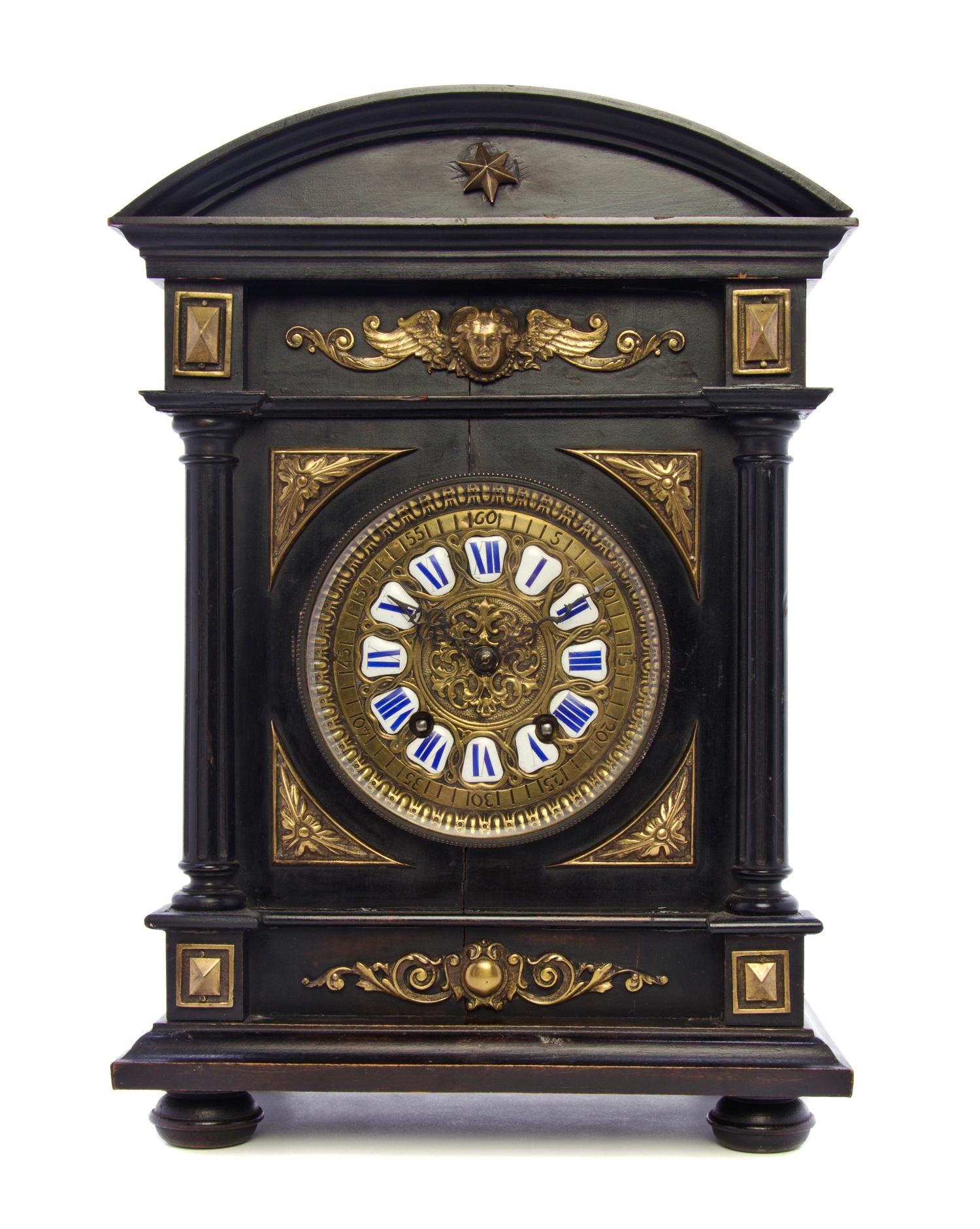 A German Neoclassical Ebonized and Bronze Mounted Mantel Clock, Lenzkirch, Height 14 3/4 inches.