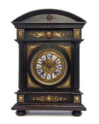 A German Neoclassical Ebonized and Bronze Mounted Mantel Clock, Lenzkirch, Height 14 3/4 inches.