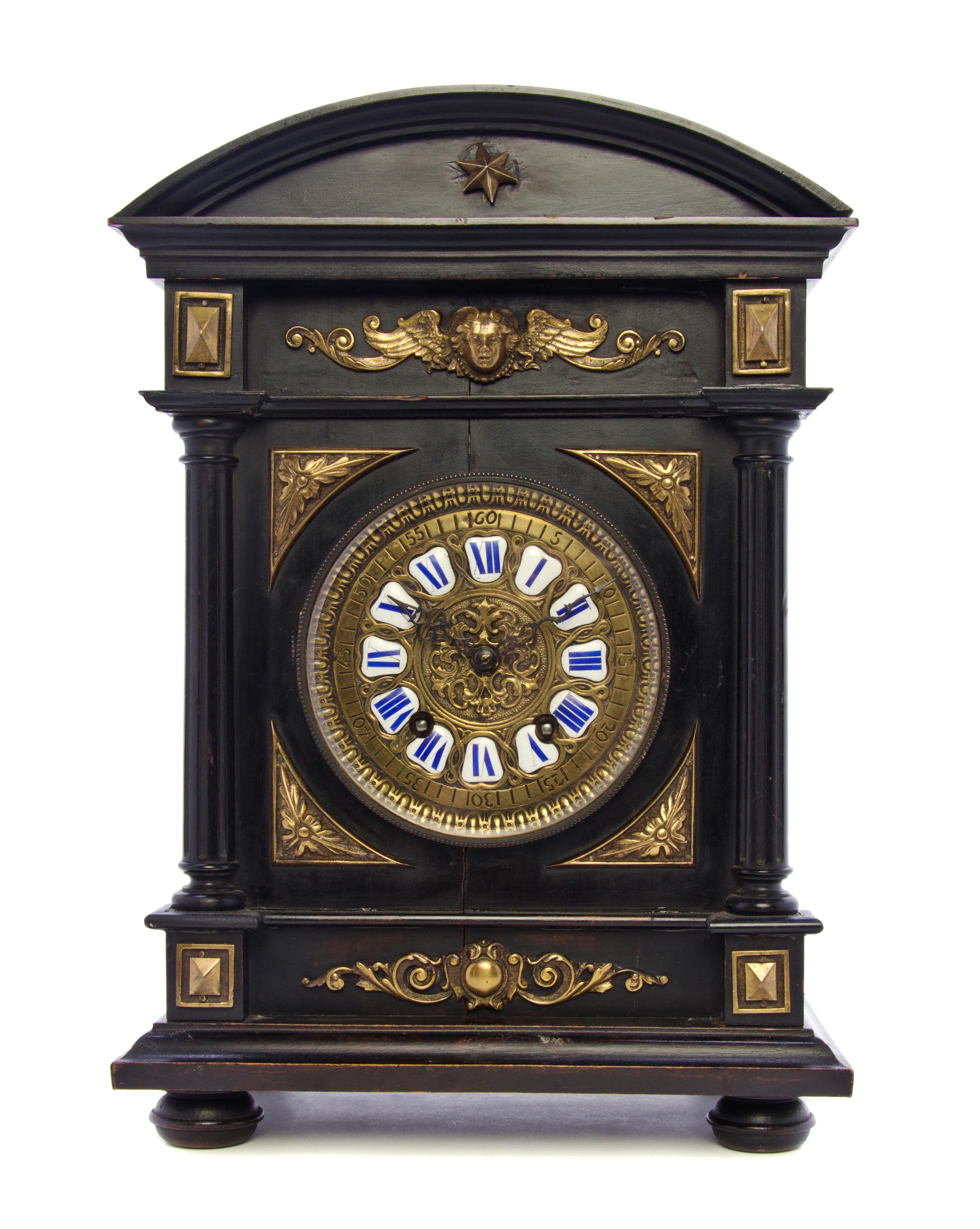 A German Neoclassical Ebonized and Bronze Mounted Mantel Clock, Lenzkirch, Height 14 3/4 inches.