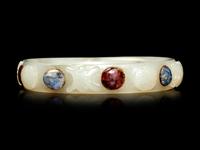 A Hardstone Inset White Jade Bangle