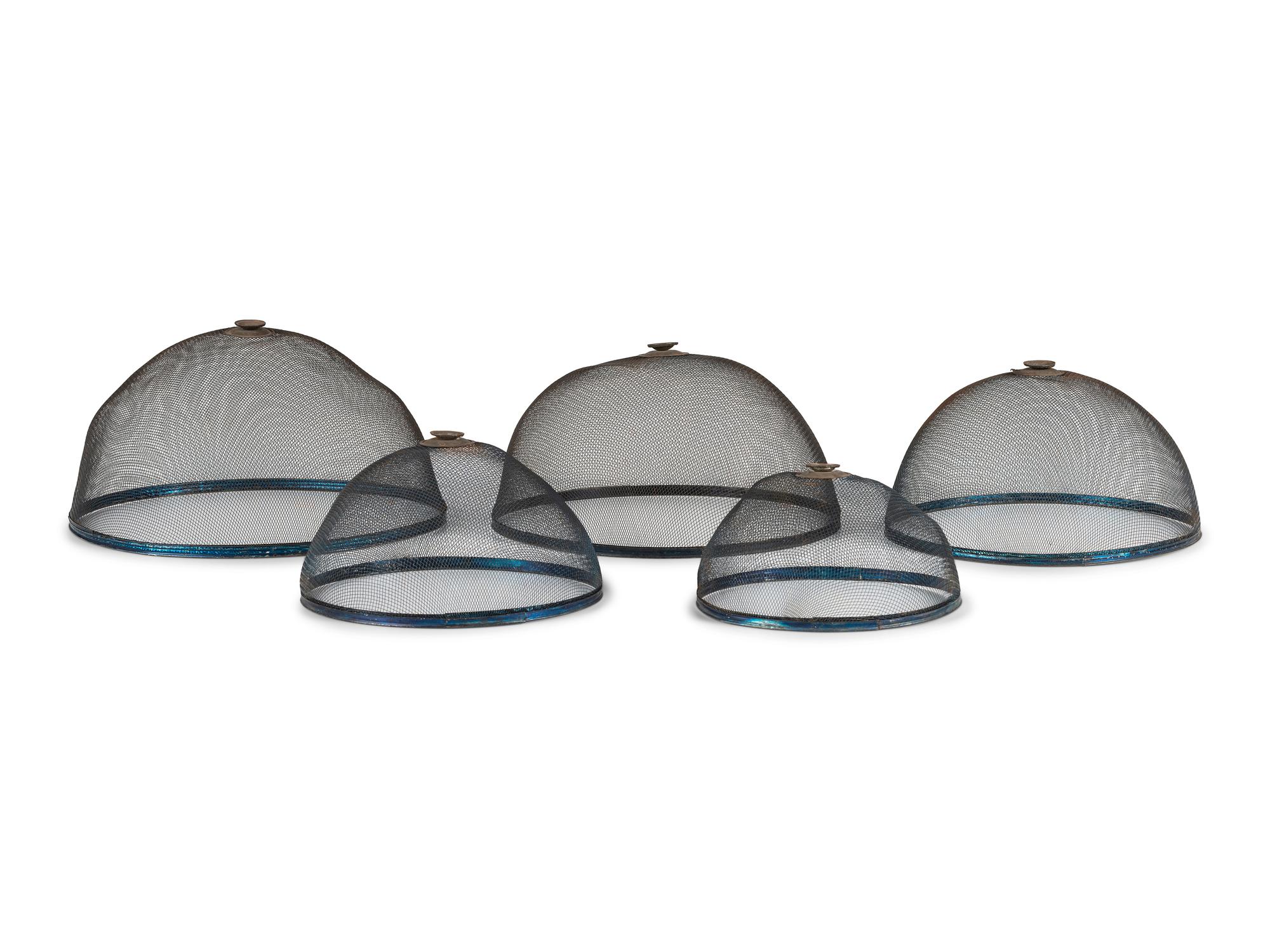 A Stacking Set of Five Wire Screen Food Covers