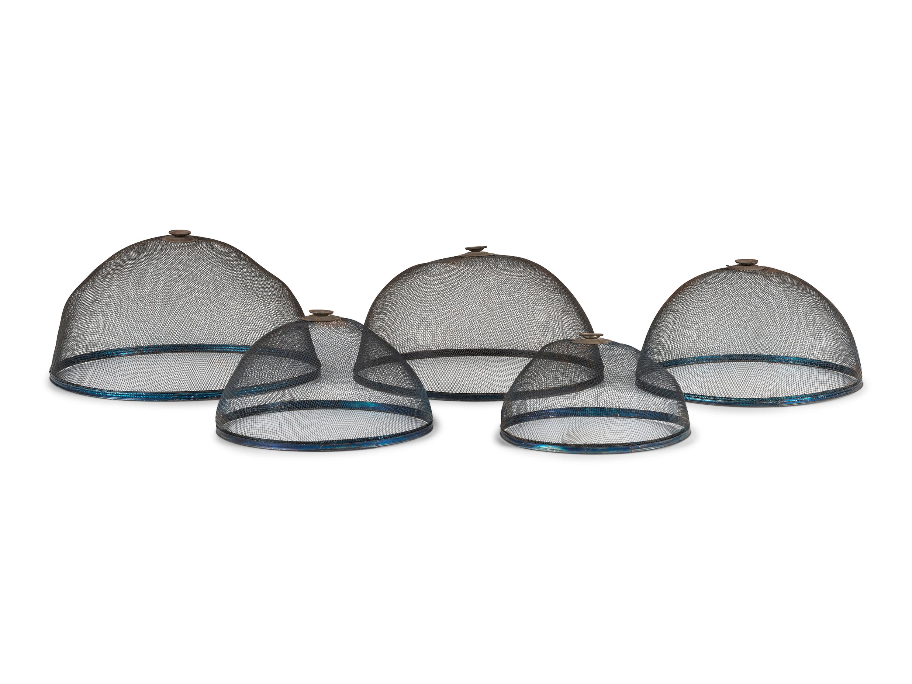 A Stacking Set of Five Wire Screen Food Covers