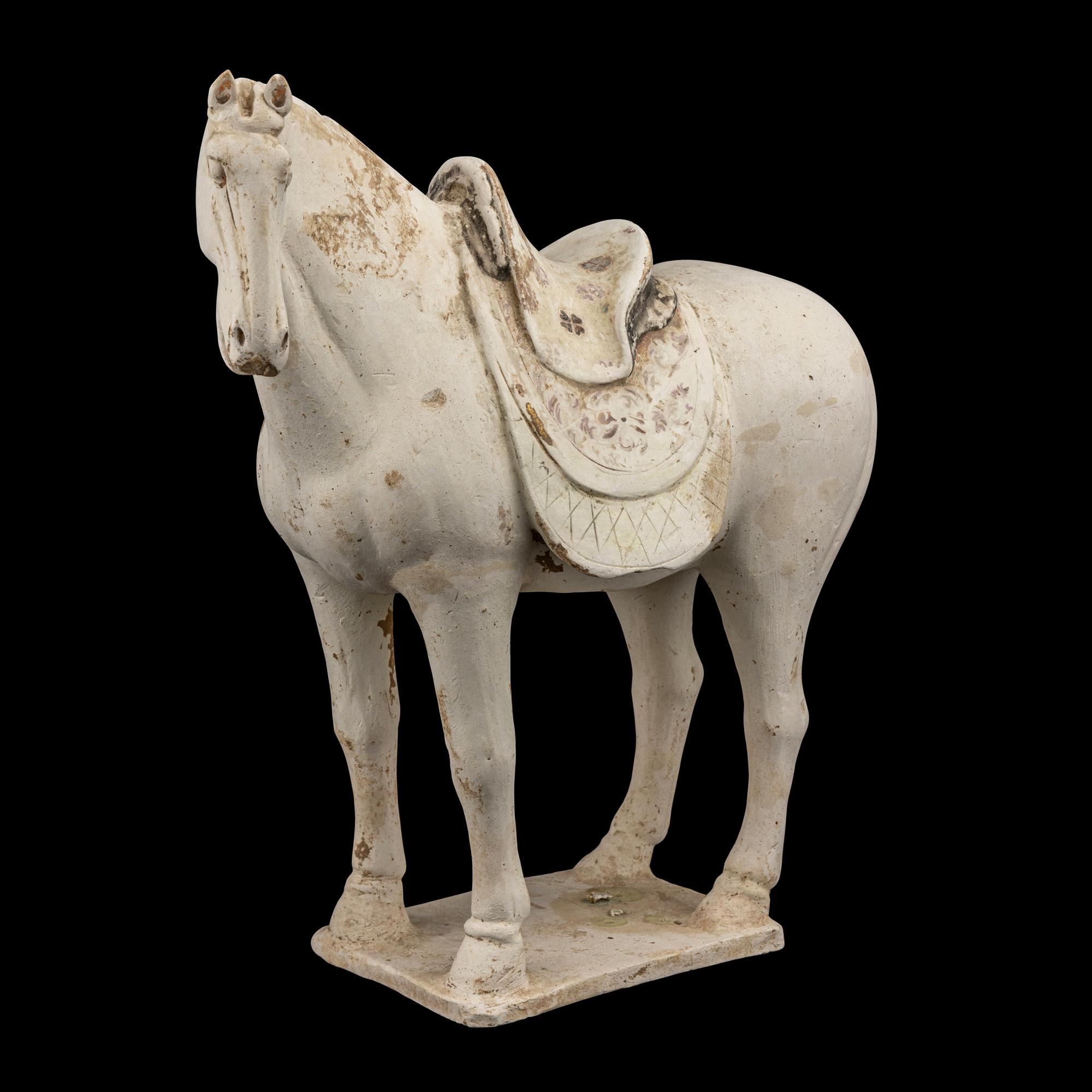 A Chinese Painted Pottery Figure of a Horse