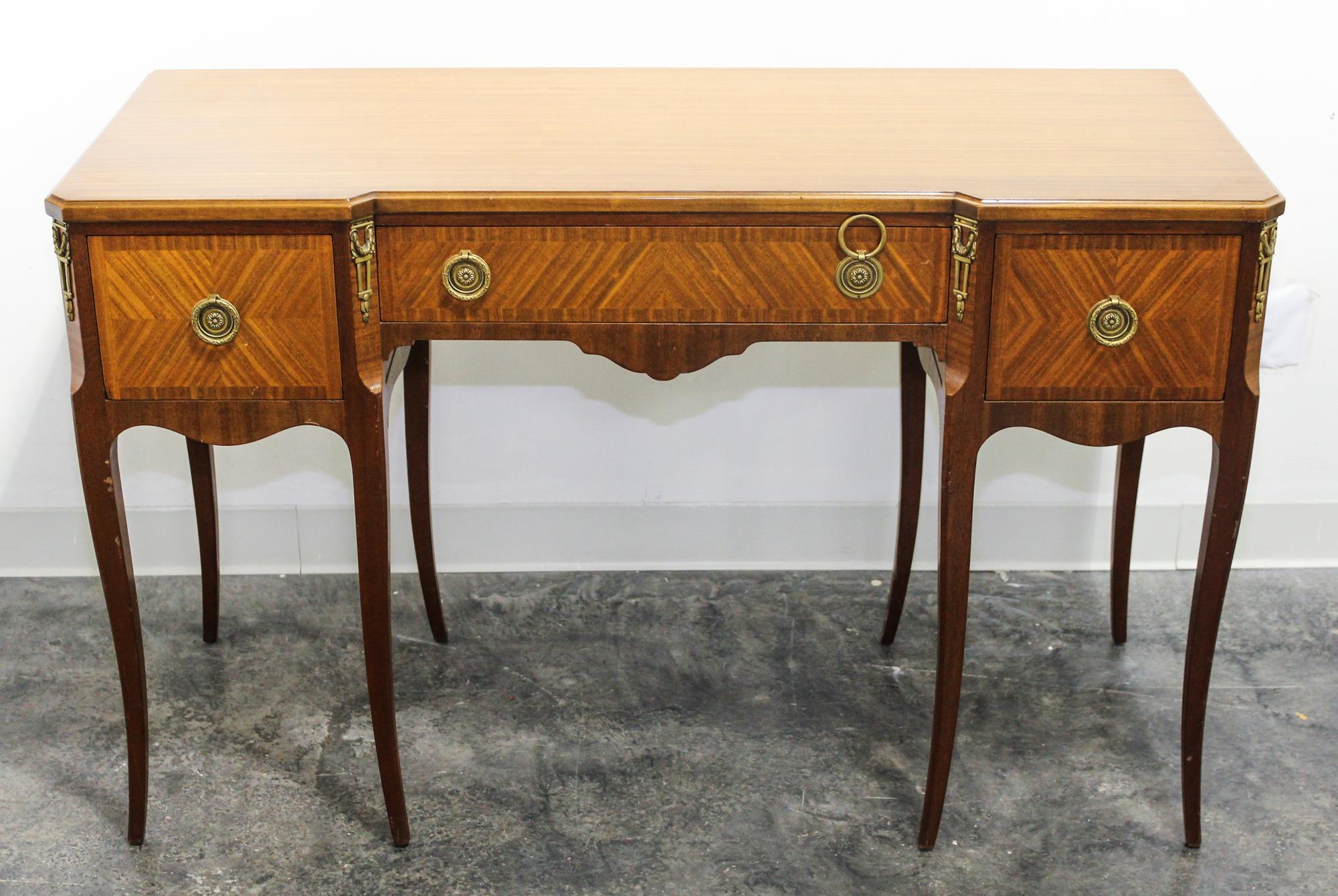 A Widdicomb Dressing Table. Height 30 x width 48 1/2 x depth 19 1/2 inches.