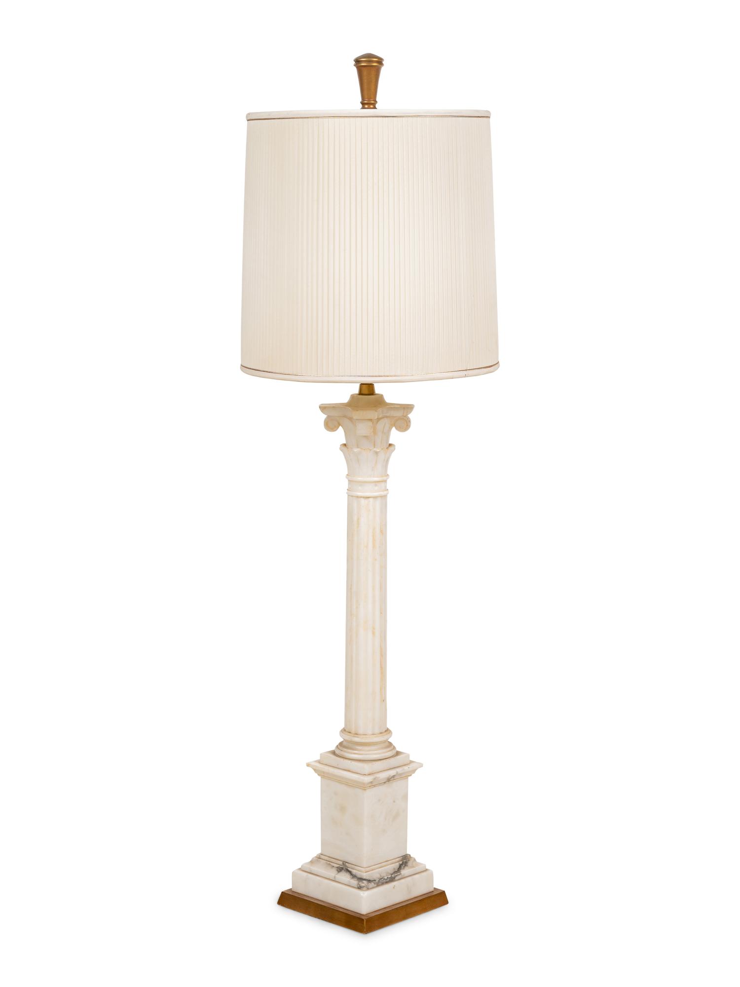 A Carved Marble Columnar Lamp