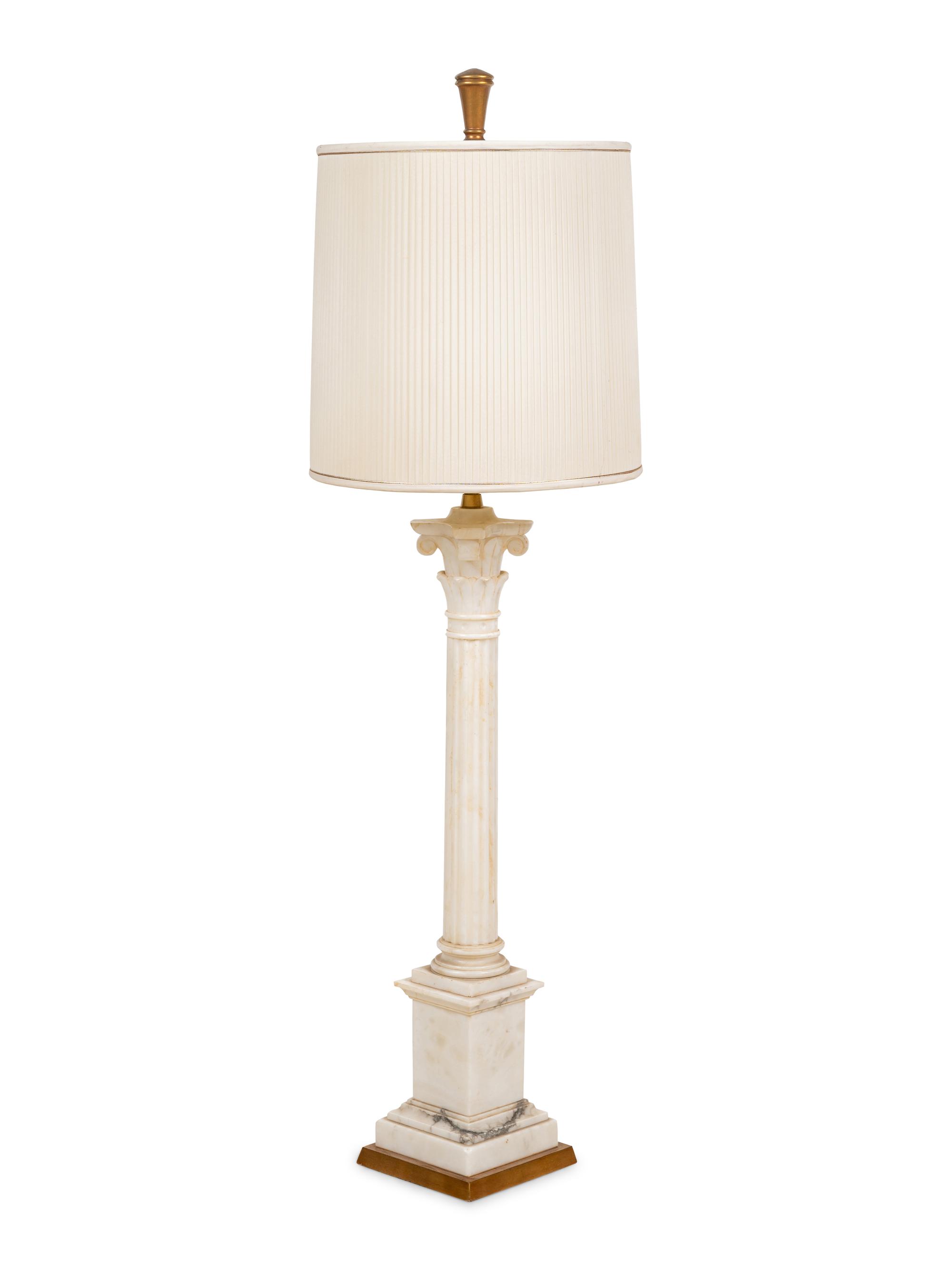 A Carved Marble Columnar Lamp